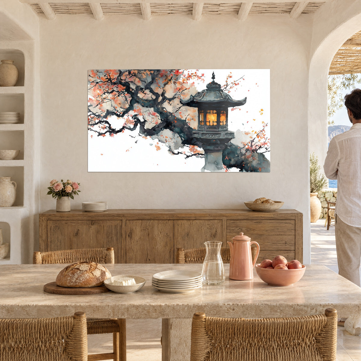 Cuadro jardín zen en acuarela con linterna de piedra pizarra y pétalos salmón, sobre una pared beige junto a una mesa de comedor de madera