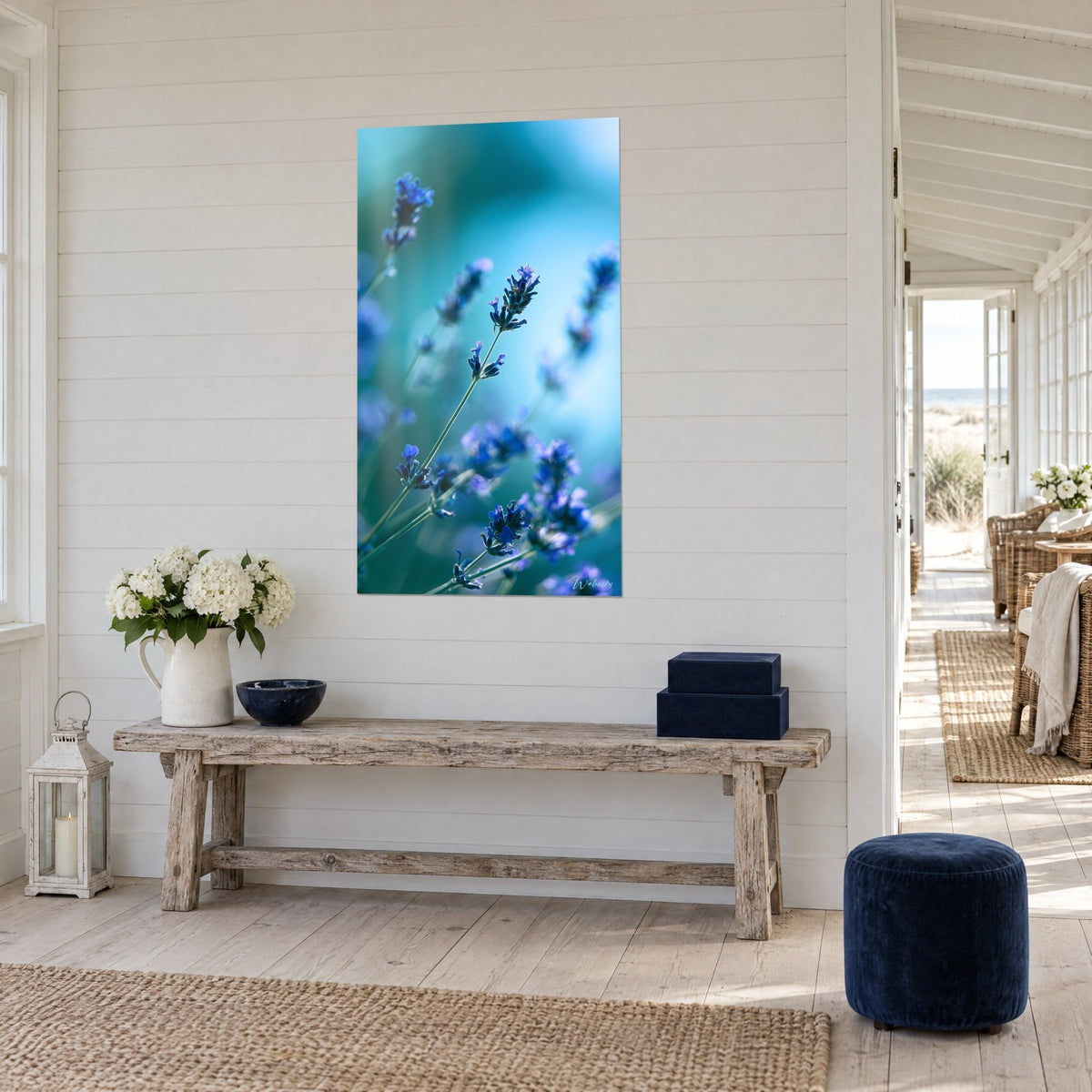 Wall art royal blue lavender stems in macro, cyan and sea-green glow, on a white paneled wall beside a wooden bench