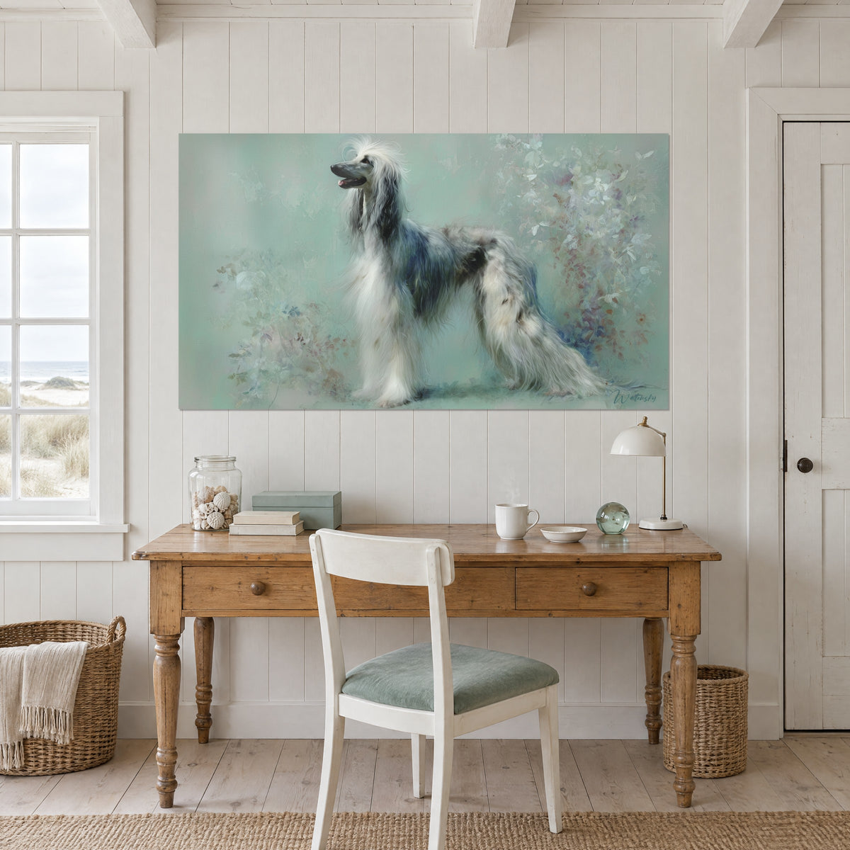 Wall art of a slender white and grey hound on a celadon-green background with mauve flowering branches, hung above a light wood desk