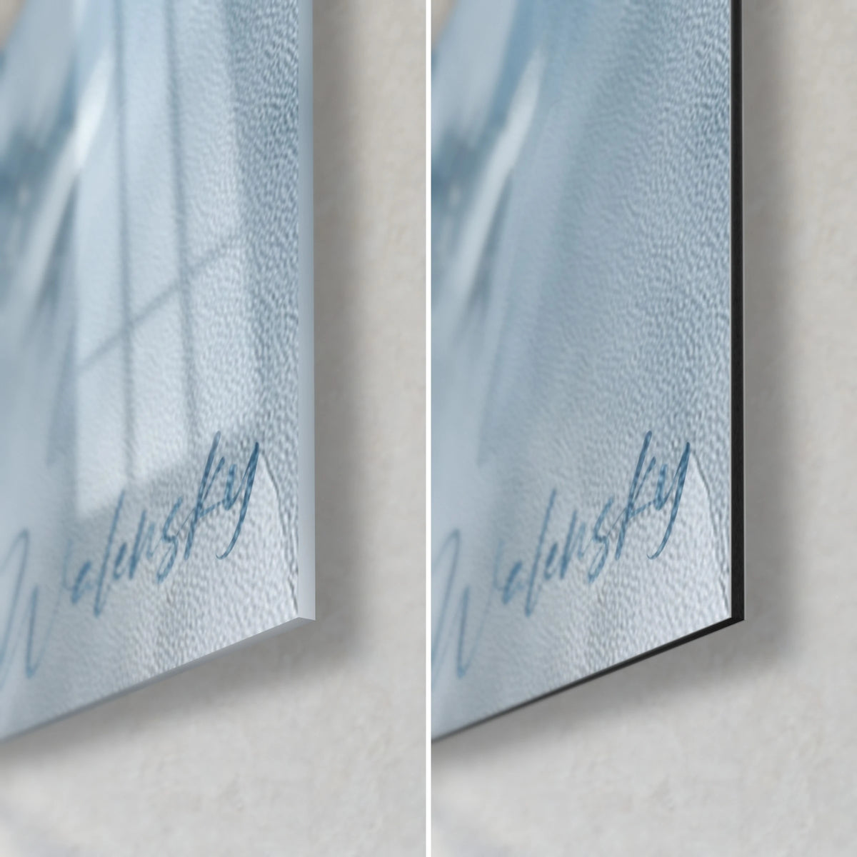 Wall art of a blue and white wolf eye, bottom right corner: glossy glass on the left, matte Dibond on the right, 3 mm black edge