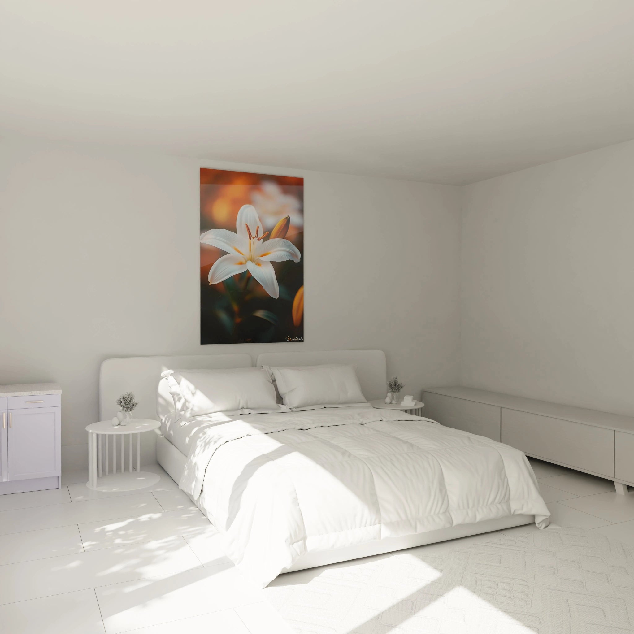 Un tableau Lys nature illustrant un gros plan d’une fleur blanche, avec un bouton fermé et des étamines orange, sur un arrière-plan diffus couleur orange.