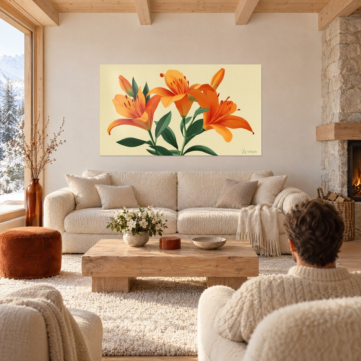Tableau trois lys orangés aux feuilles vert sapin sur fond ivoire, au-dessus d'un canapé dans un salon lumineux