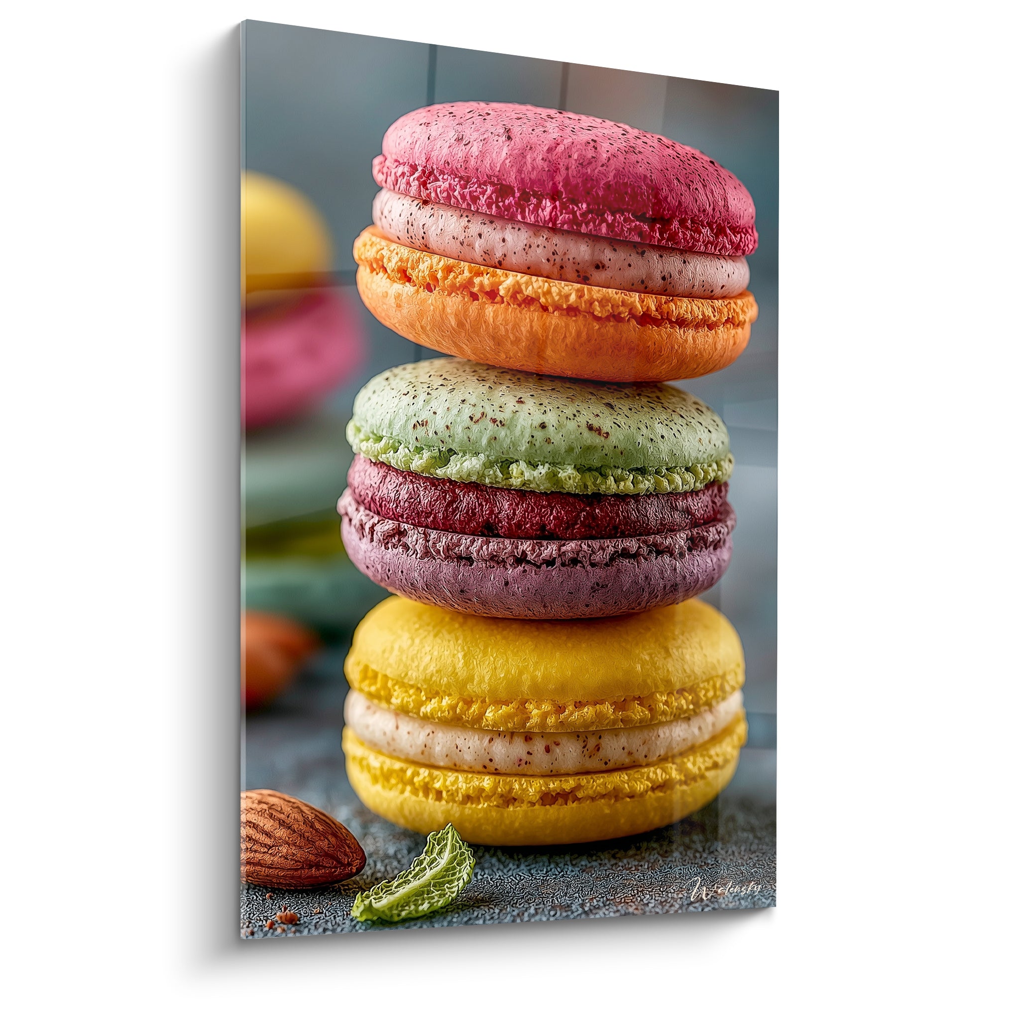 Macarons empilés rose framboise, jaune citron et vert pistache aux coques craquelées texturées