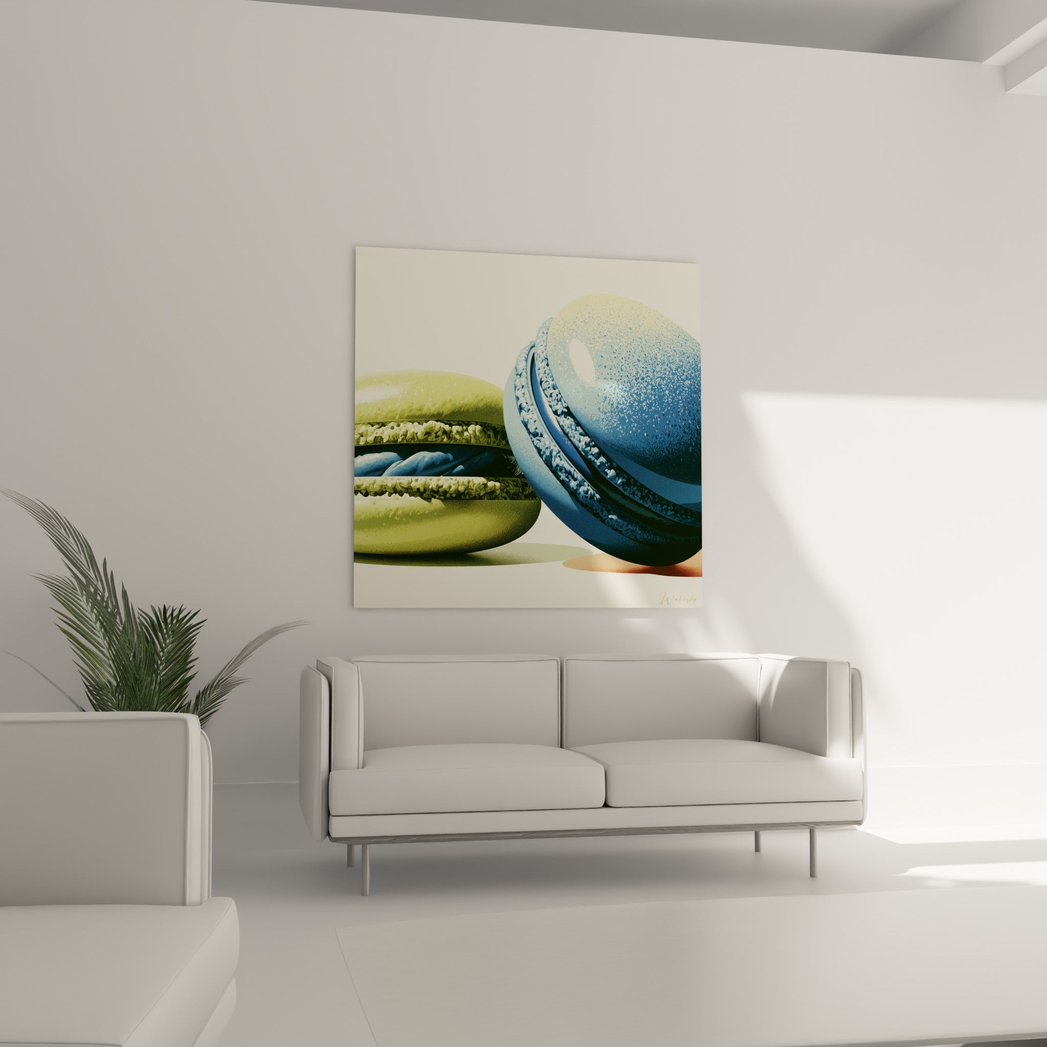 Macaron vert sauge et bleu marine à la garniture visible, au-dessus d'un canapé dans un salon lumineux