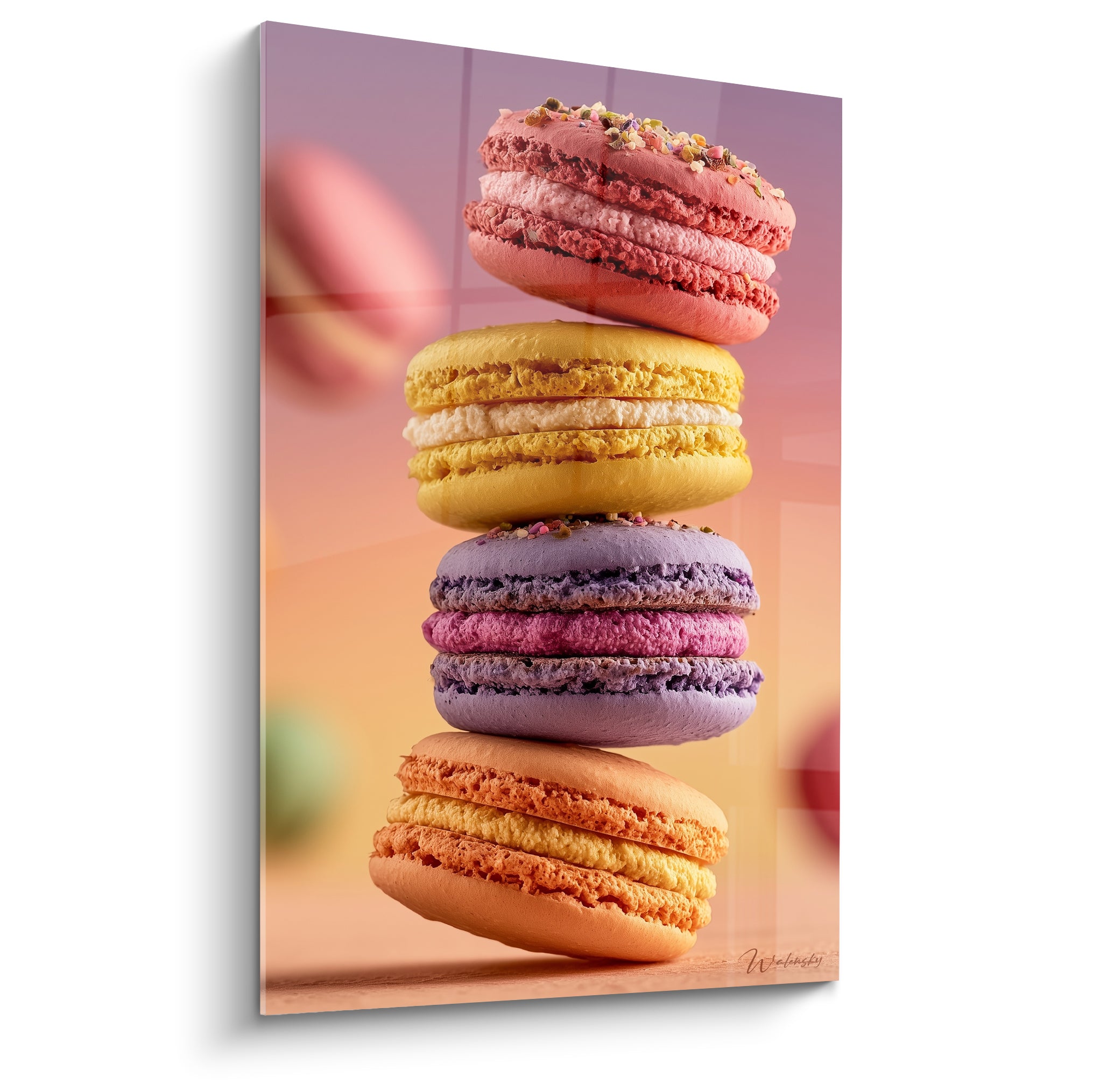 Macarons empilés en équilibre, dégradé rose, violet et jaune, texture pâtissière détaillée