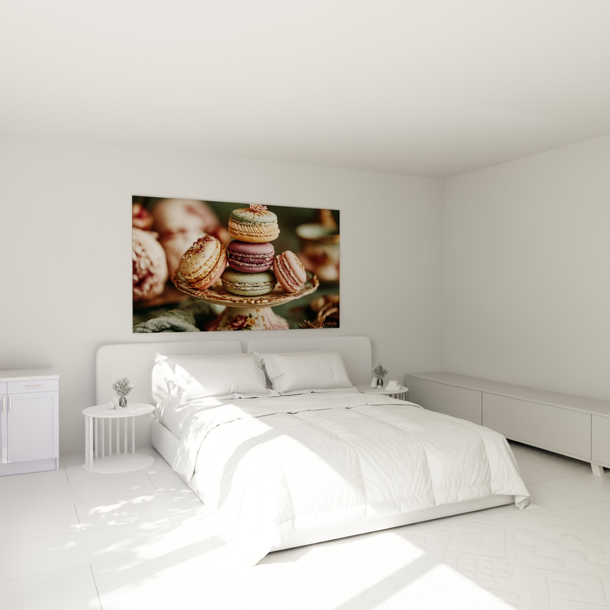 Pile de macarons roses et prune au-dessus d'un lit dans une chambre claire