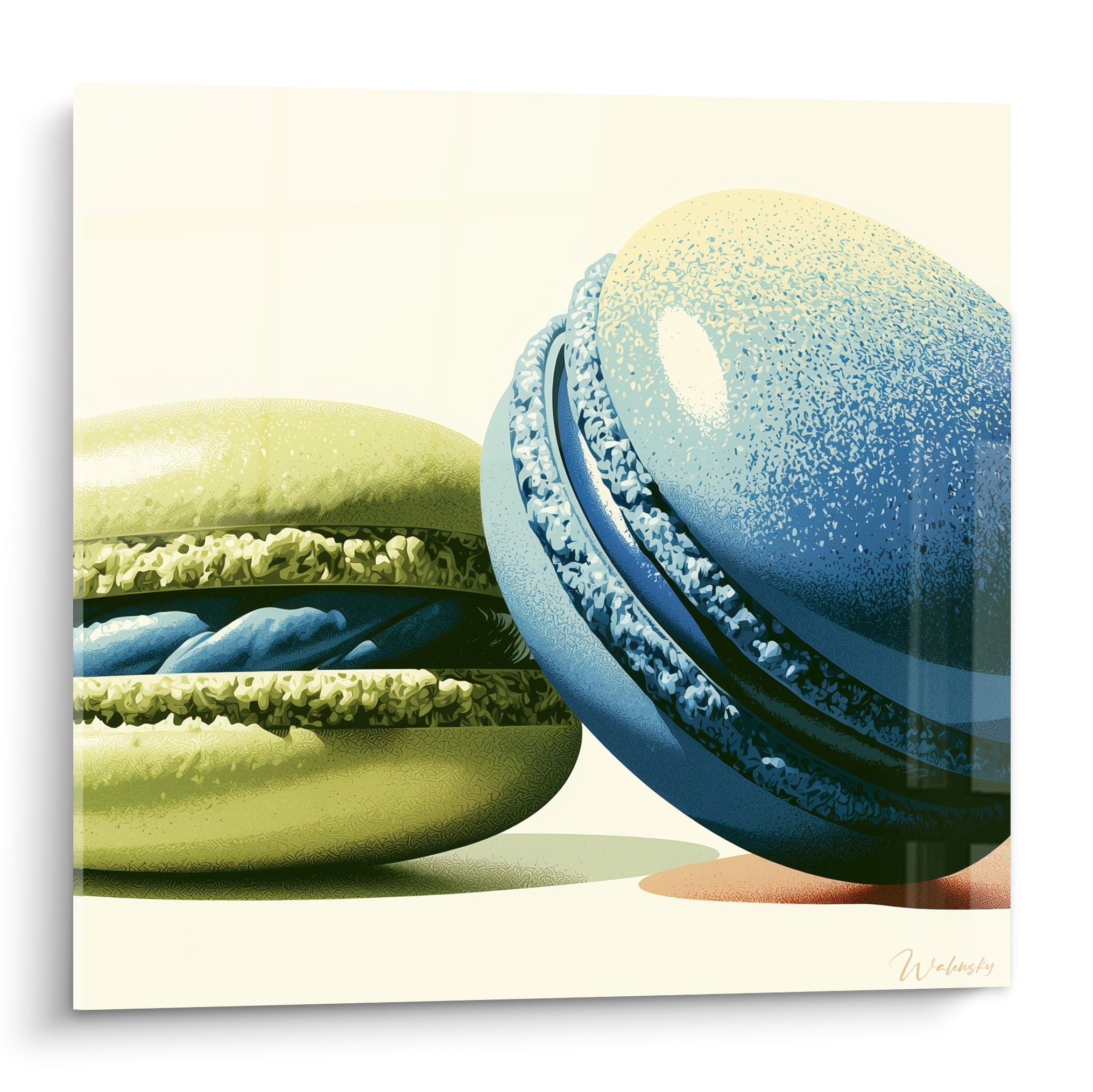 Macaron vert sauge entrouvert et macaron bleu marine bombé, texture granuleuse sur fond ivoire