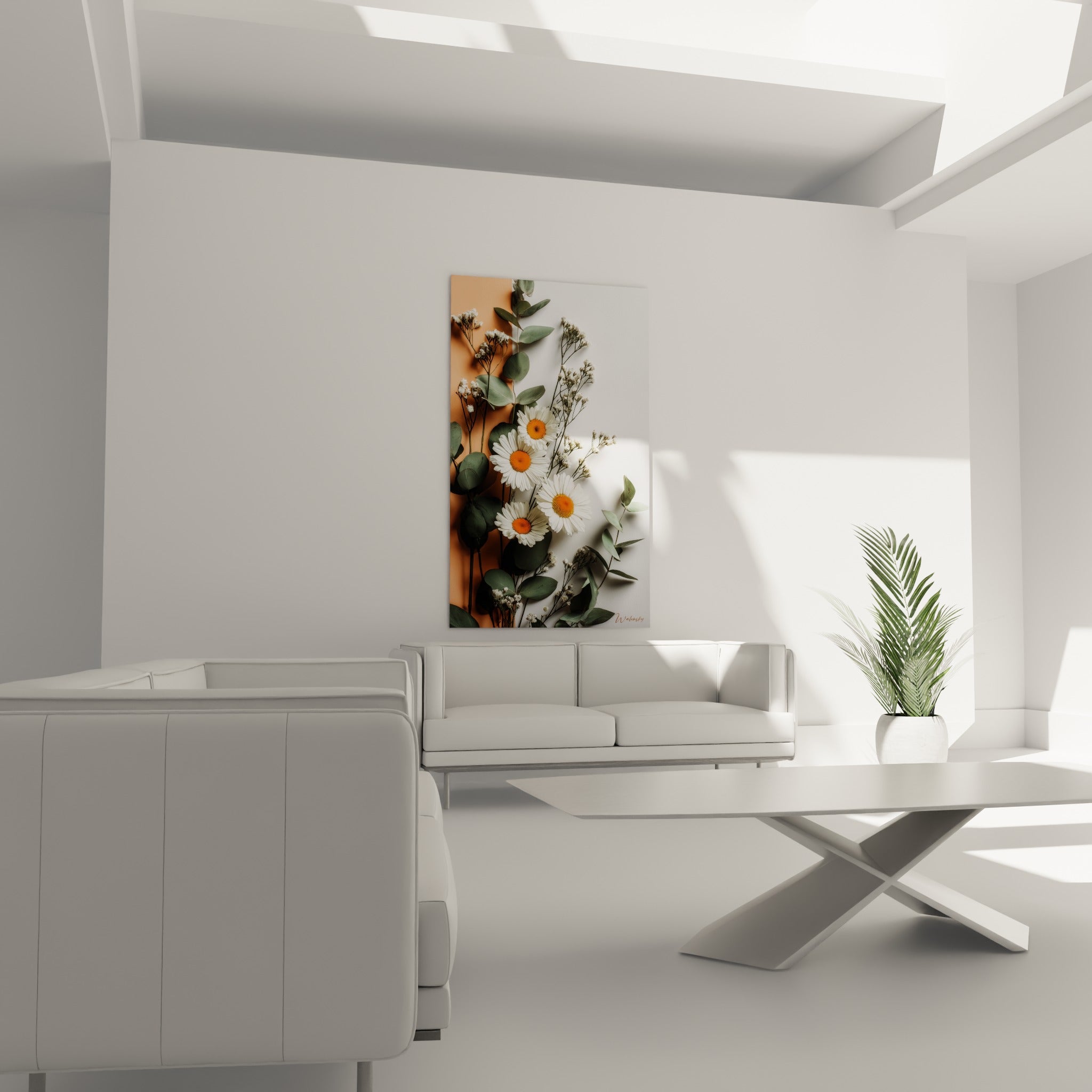 Marguerites blanches à cœur orangé et branches d'eucalyptus disposées au-dessus d'un canapé dans un salon lumineux