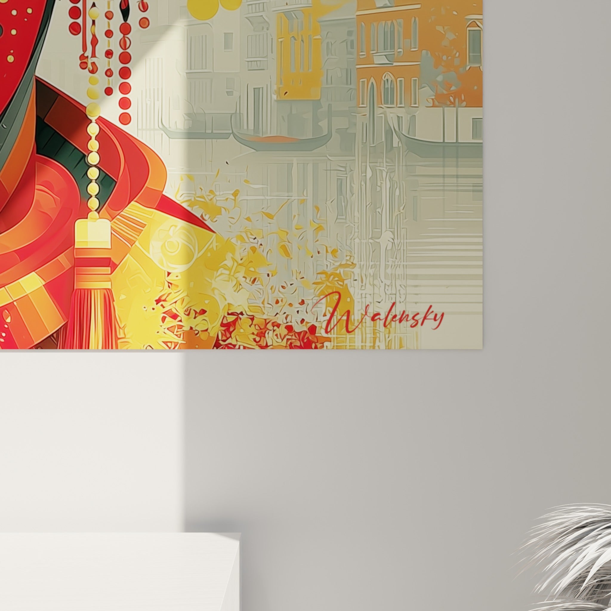 Détail du masque de Venise montrant les nuances de rouge, d'or et de noir en gros plan sur la toile