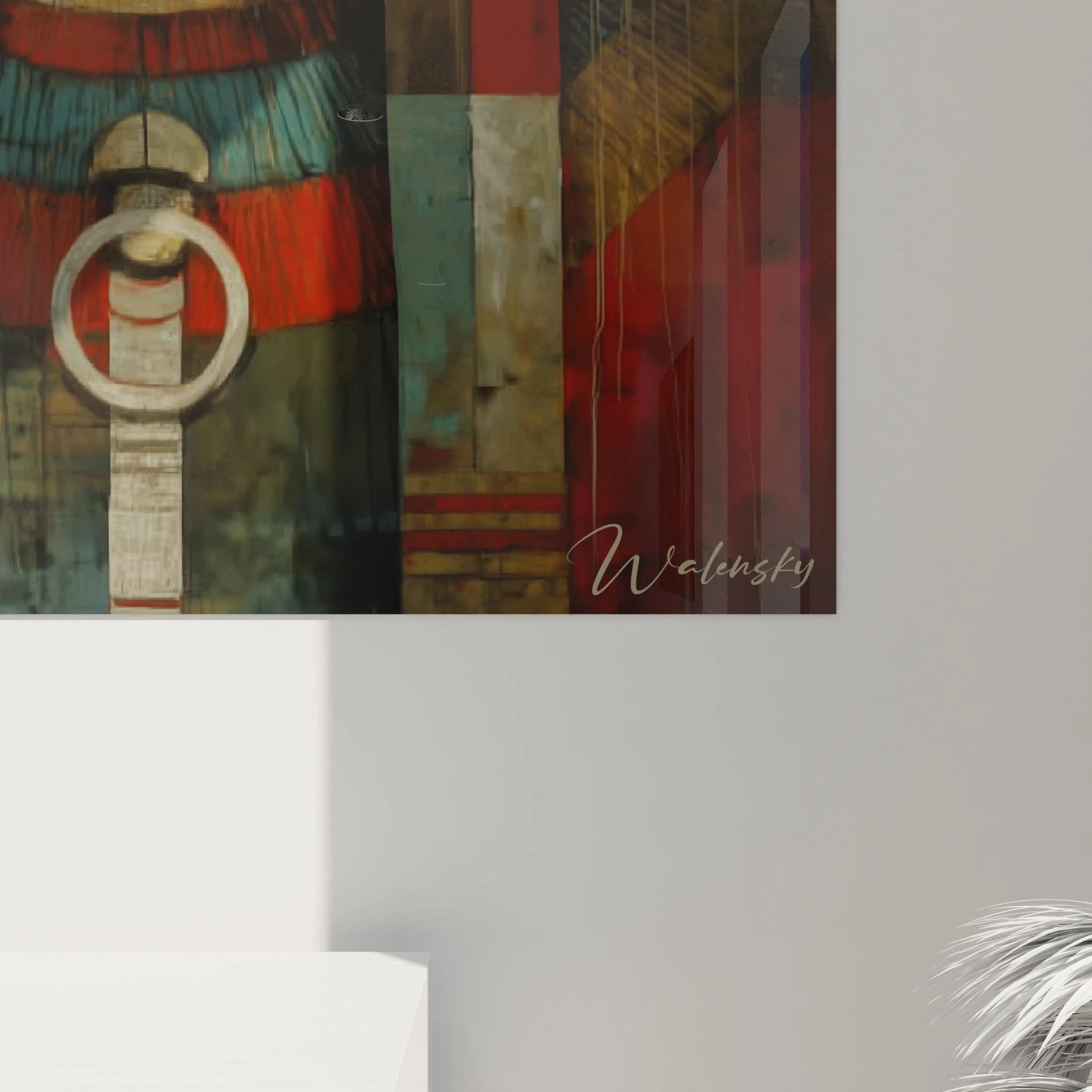 Tableau mural Walensky tableau masque tribal aux tons rouges turquoise et bruns motif de masque ethnique signé sur fond blanc