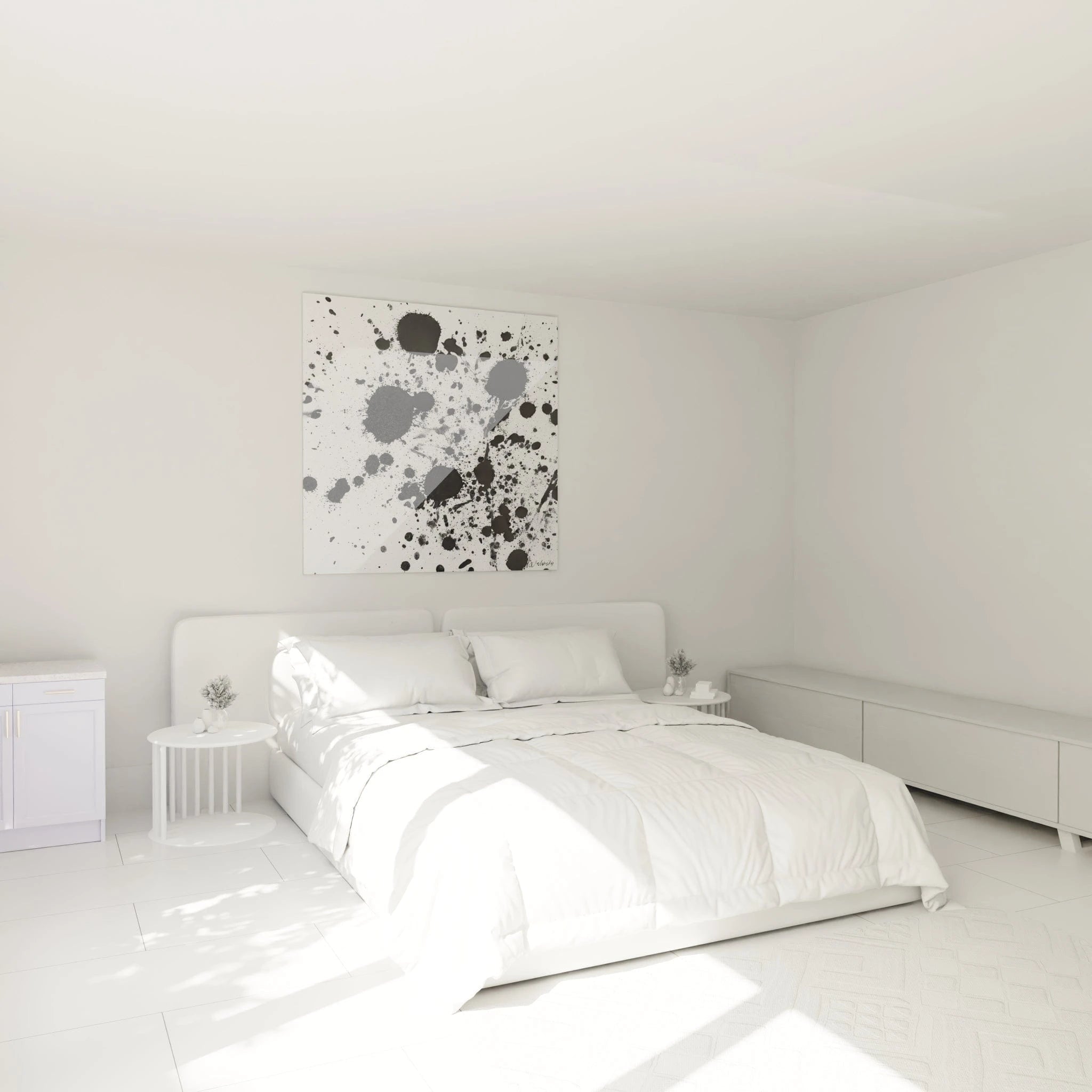 Tableau tacheté noir et blanc Walensky décorant une chambre lumineuse avec un lit blanc