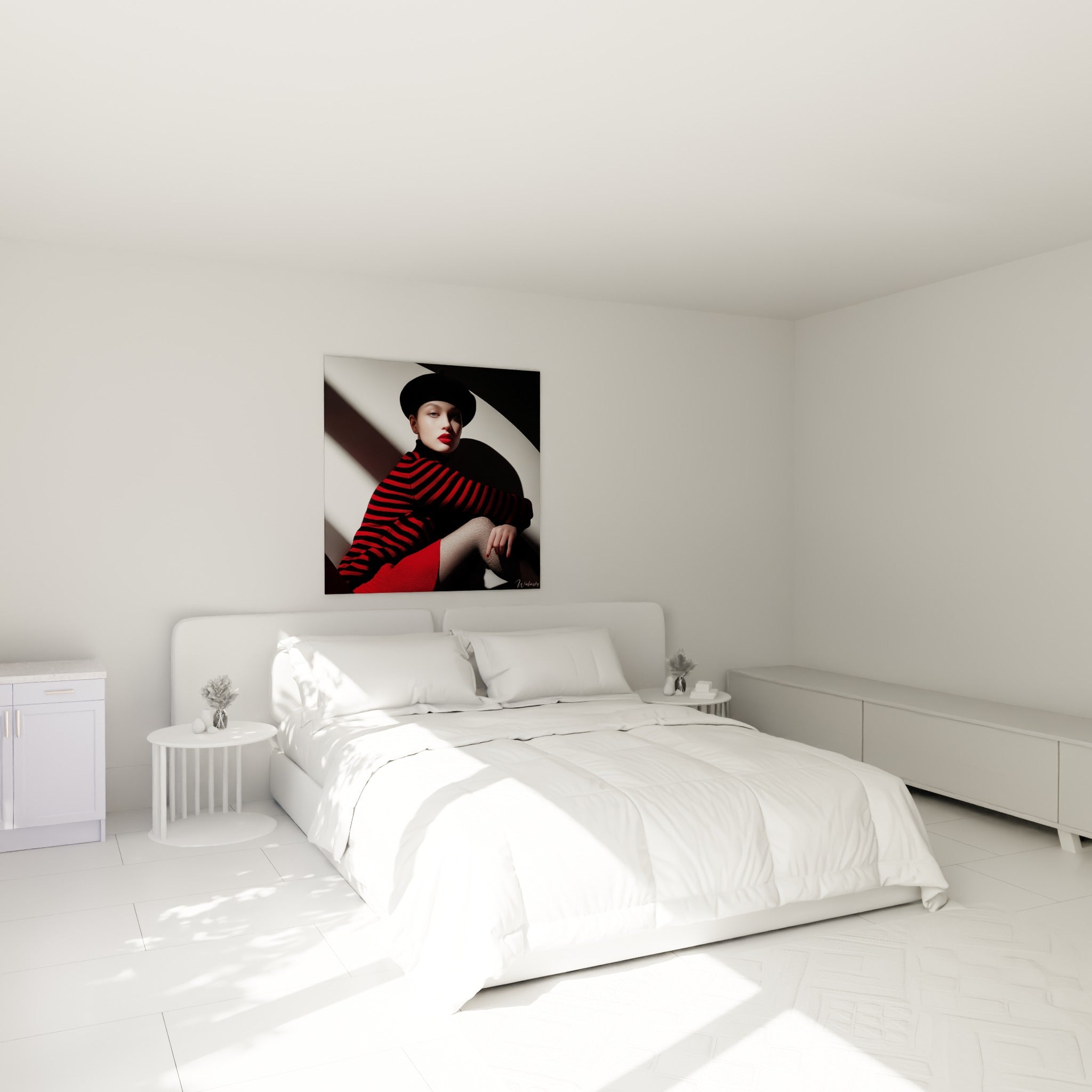 Portrait rétro aux teintes rouge et noir accroché au-dessus d'un lit dans une chambre claire