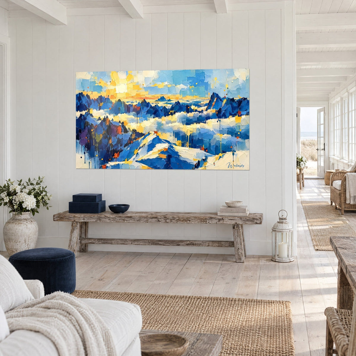 Wall art indigo rock spires under a blazing ochre sun, with paint drips, on a white wall of a seaside house