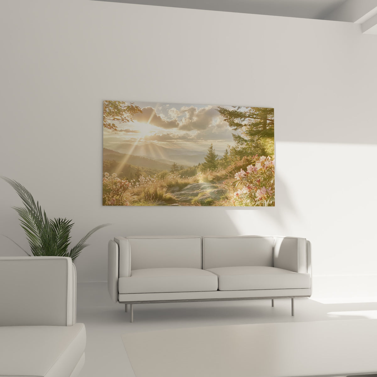 Paysage de montagne aux tons bleu pastel et rose, soleil perçant les nuages, au-dessus d'un canapé dans un salon lumineux