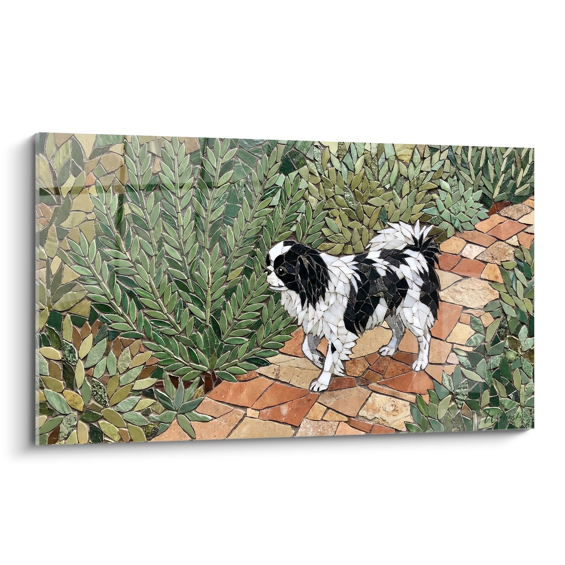 Tableau mosaique epagneul japonais noir blanc sur sentier pierre ocre entoure feuillage vert luxuriant art mural zen