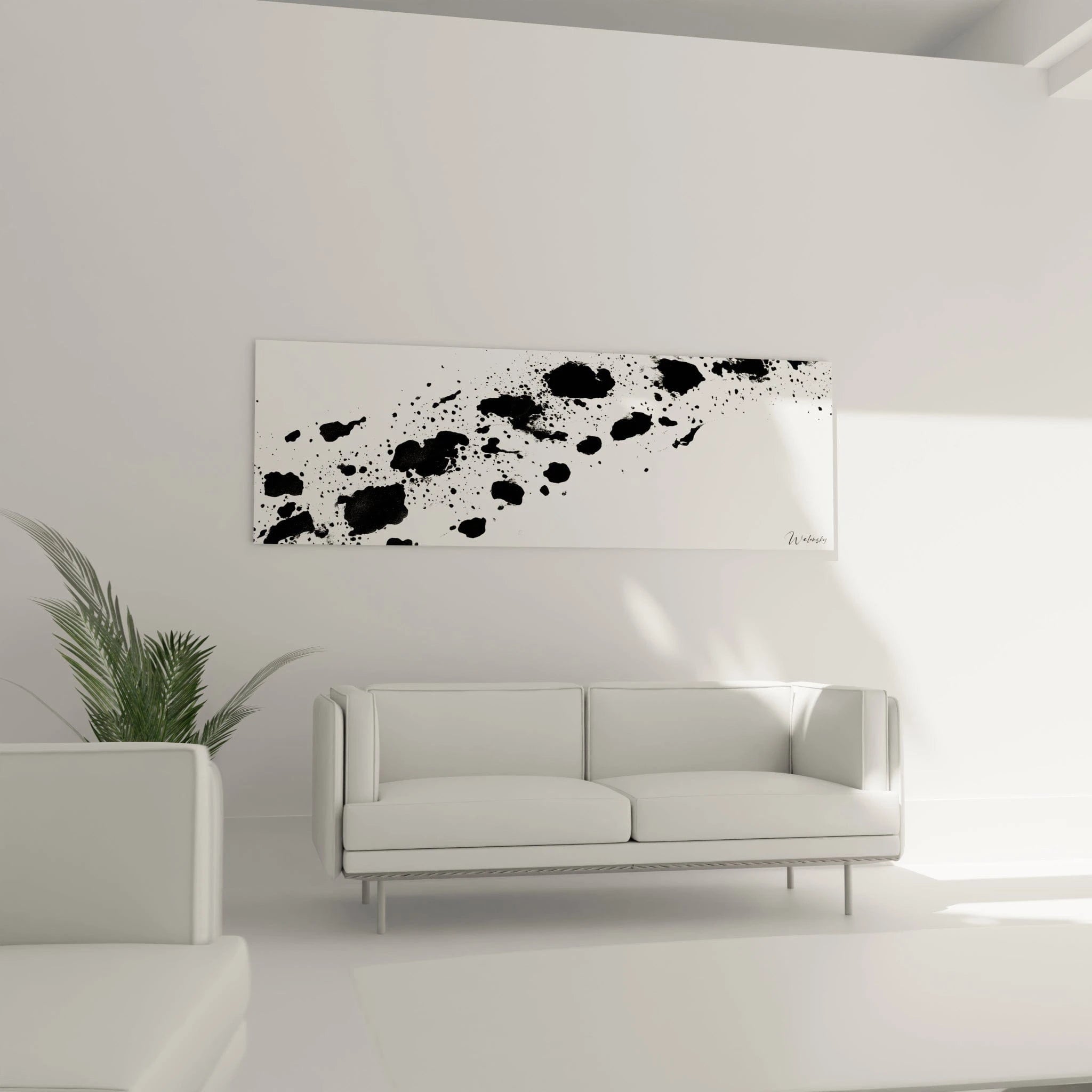 Tableau tacheté noir et blanc de Walensky décorant un salon moderne avec un canapé blanc