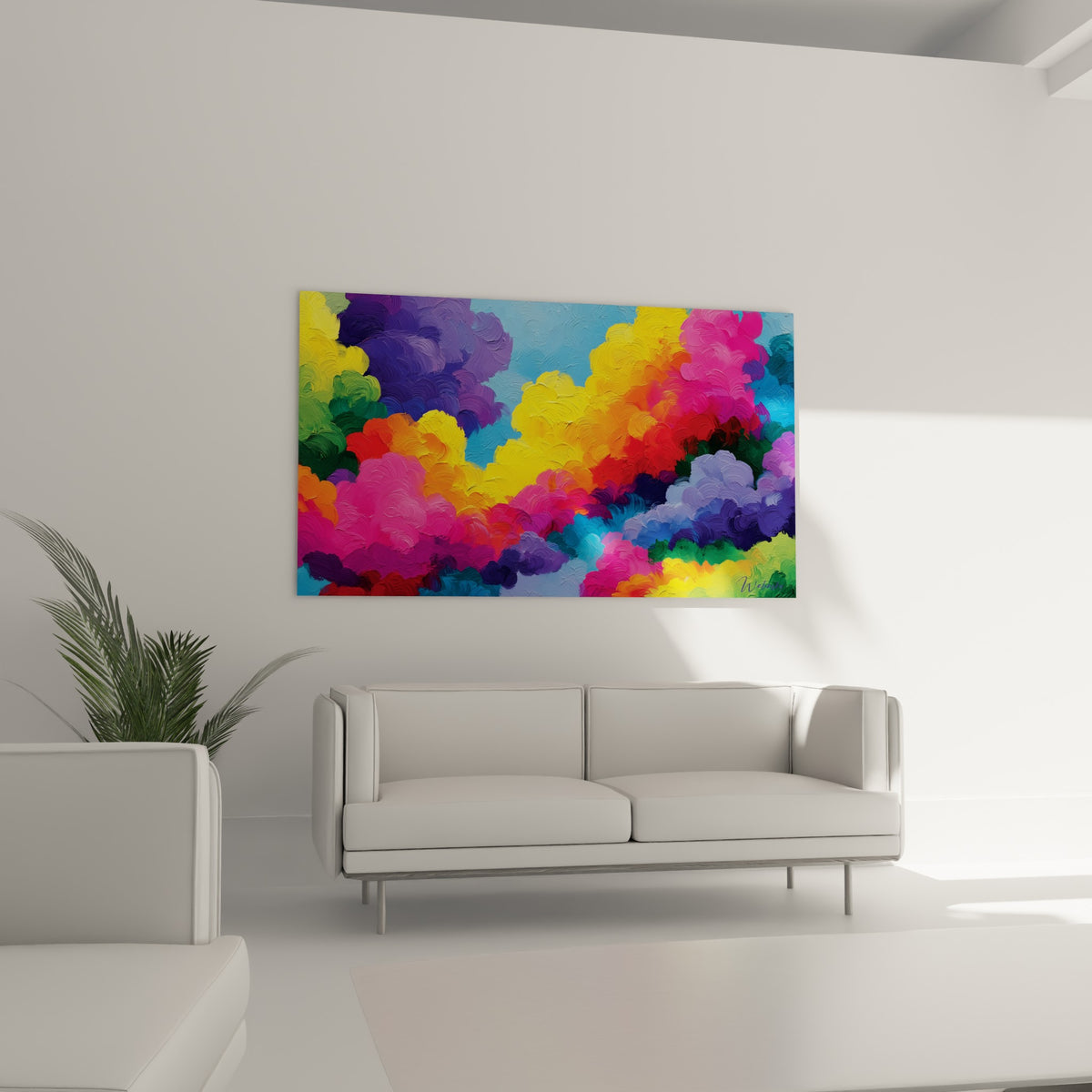 Masses colorées jaunes, fuchsia et bleu pastel au-dessus d'un canapé dans un salon lumineux