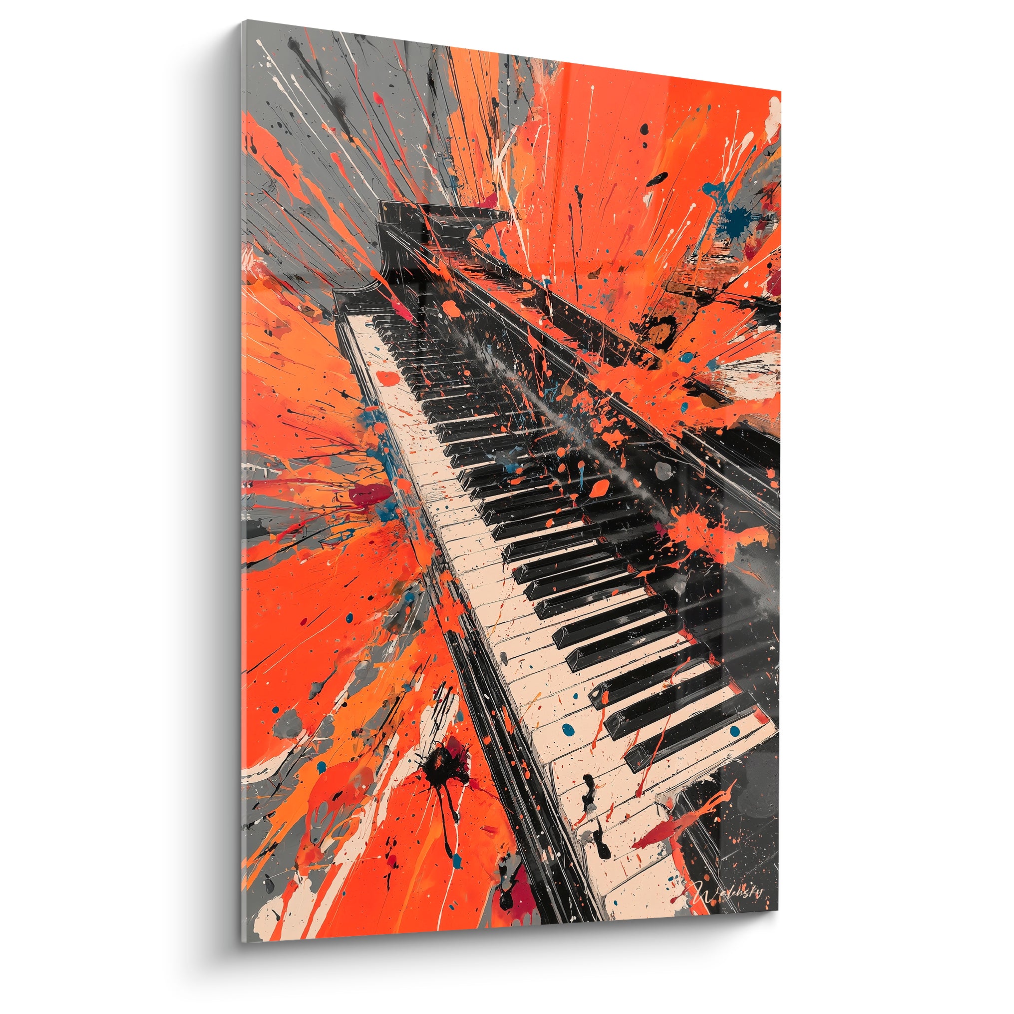 Piano éclaboussé orange et anthracite, clavier noir et blanc en diagonale saisissante