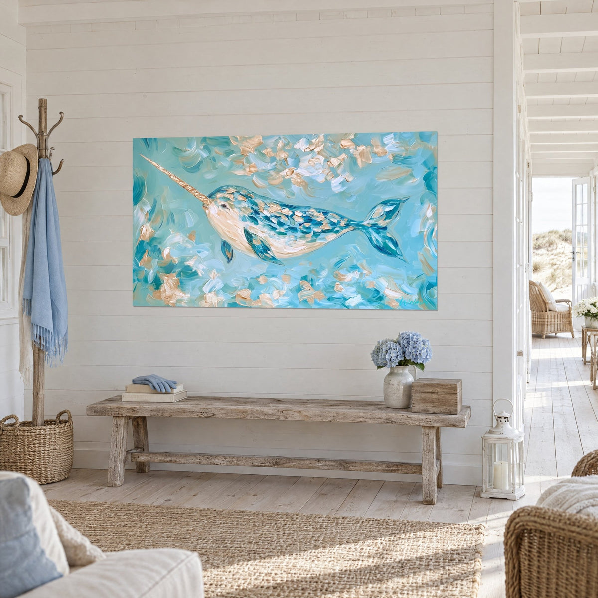 Wall art sea unicorn with teal and beige scales, three-quarter view on a white slatted wall, seaside