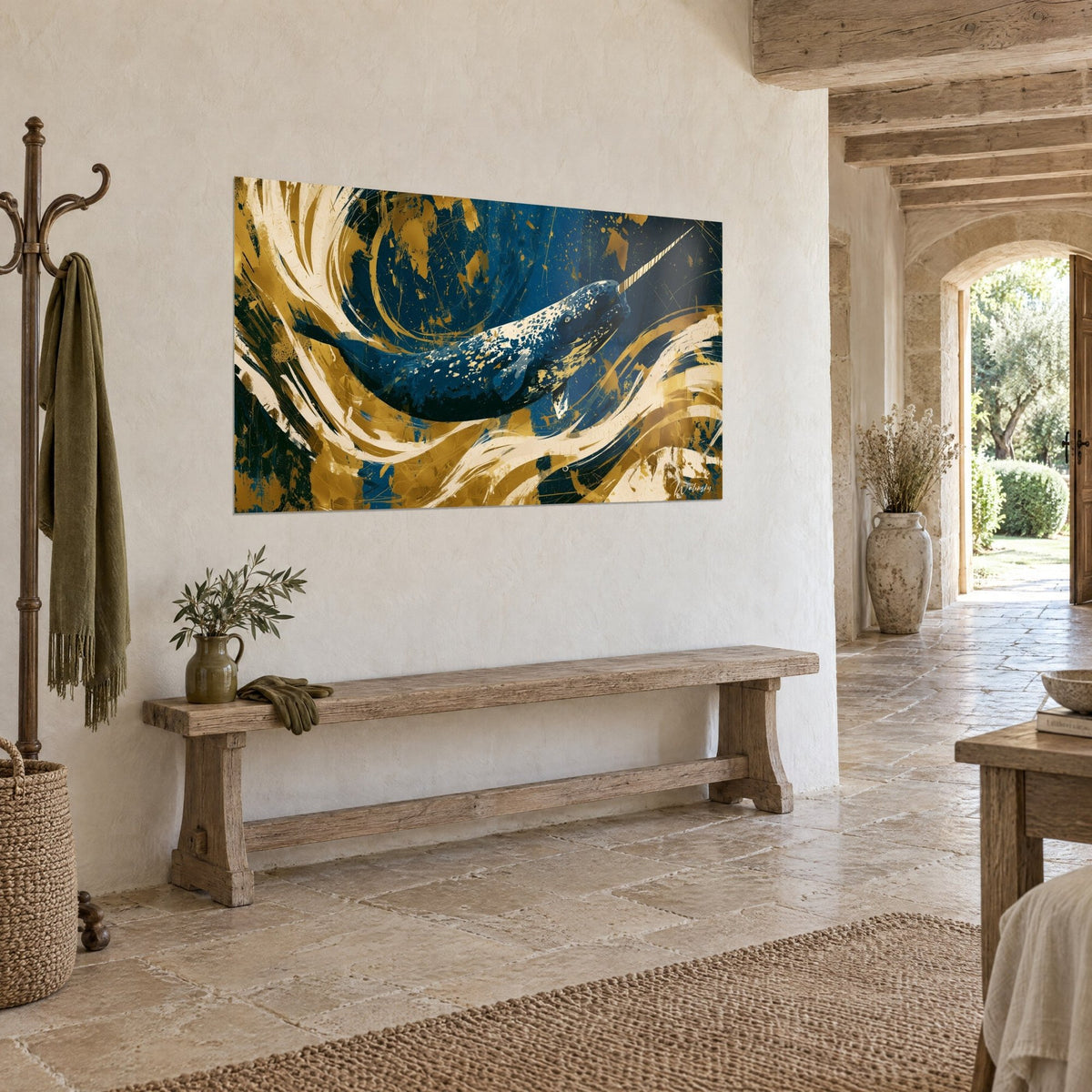 Wall art long-tusked striped cetacean slicing through golden and navy volutes, rough plaster wall, wooden bench, stone house