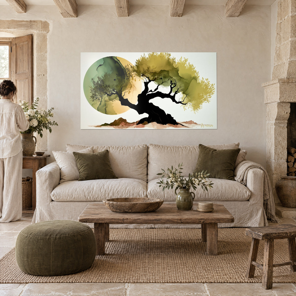 Wall art ancient olive tree with a twisted black trunk, olive green foliage and an ochre disc, above a sofa in a bright living room