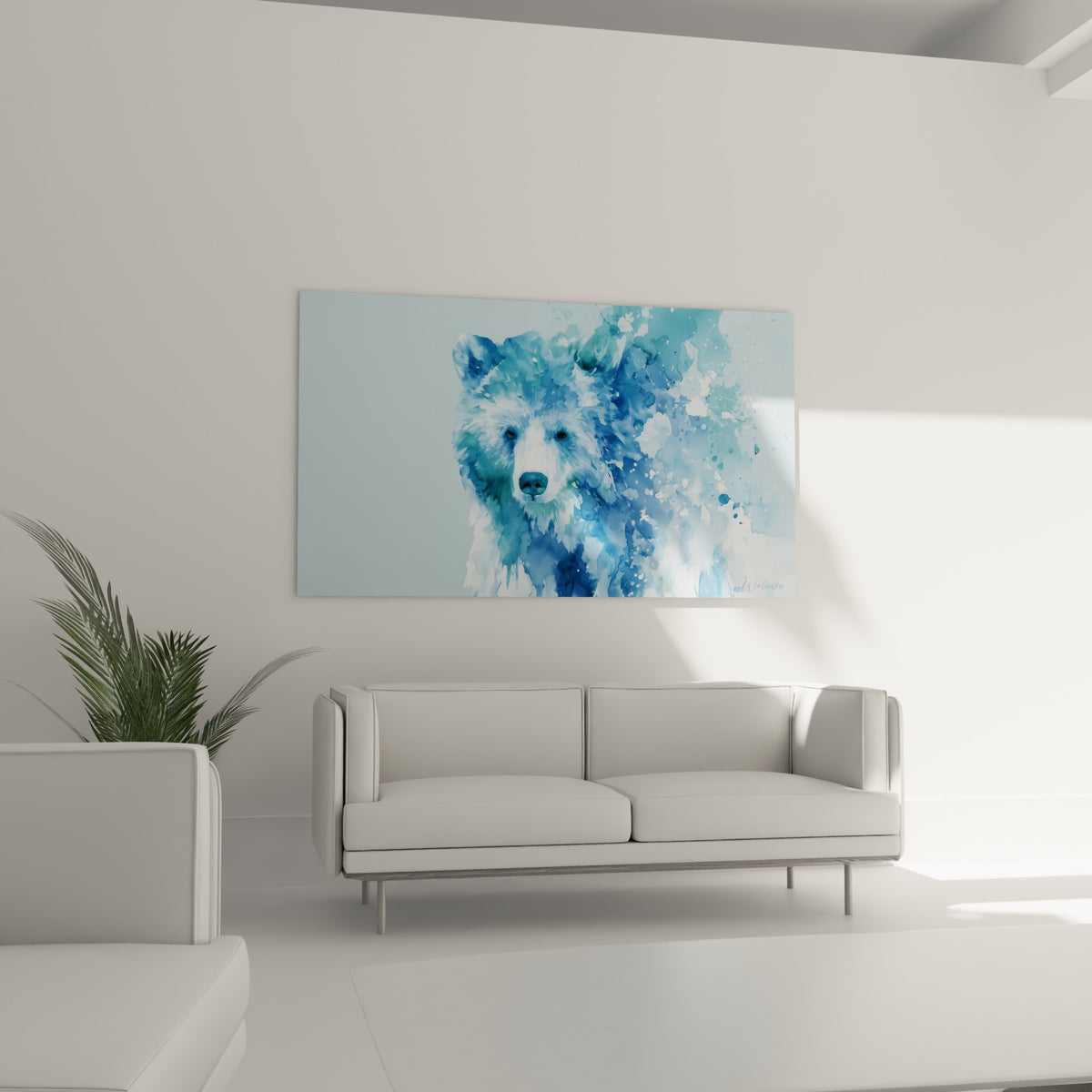 Silhouette d'ours brun bleu marine et bleu ciel accrochée au-dessus d'un canapé dans un salon lumineux