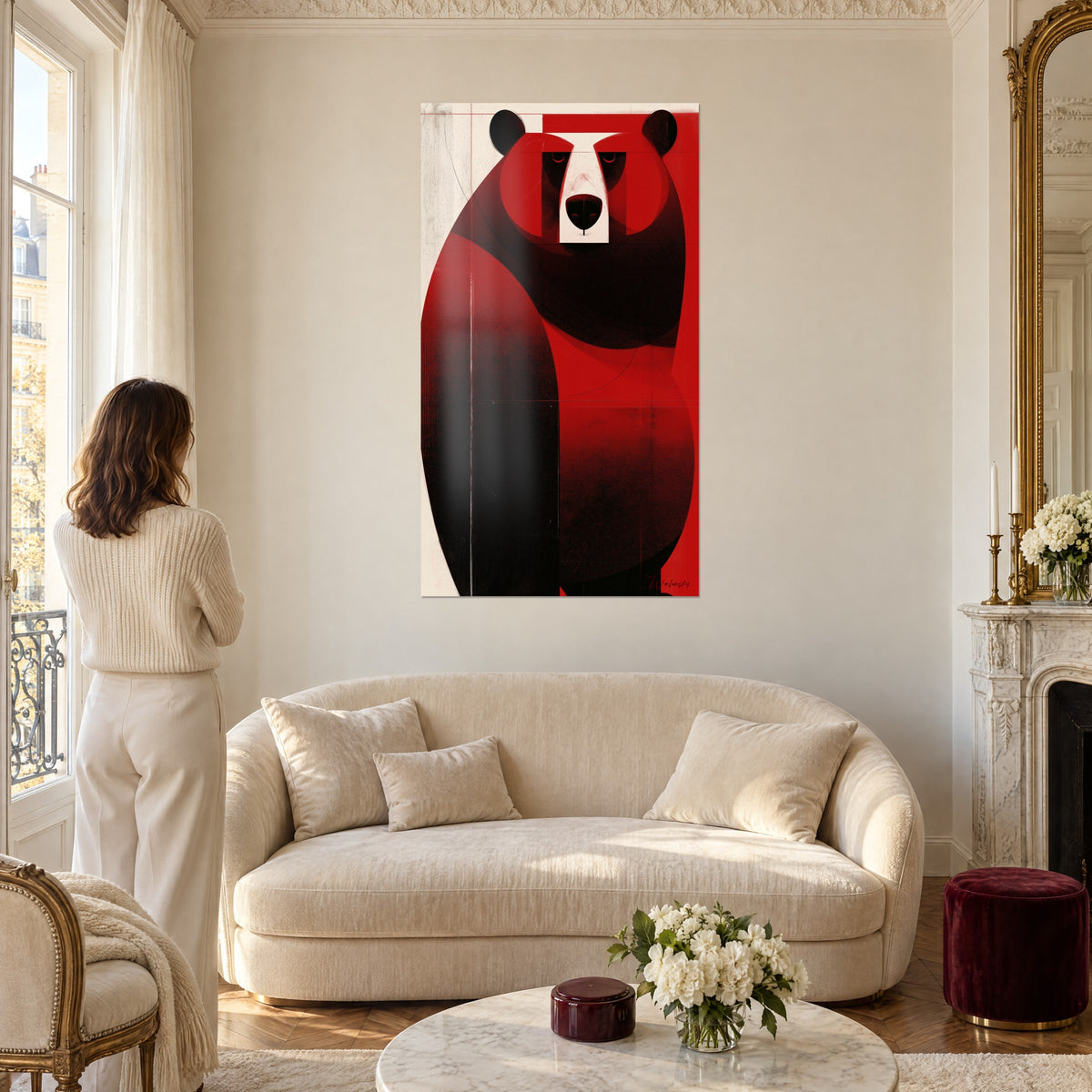 Tableau ours massif en aplats rouge vif et noir, museau ivoire carré, regard baissé, au-dessus d'un canapé dans un salon lumineux