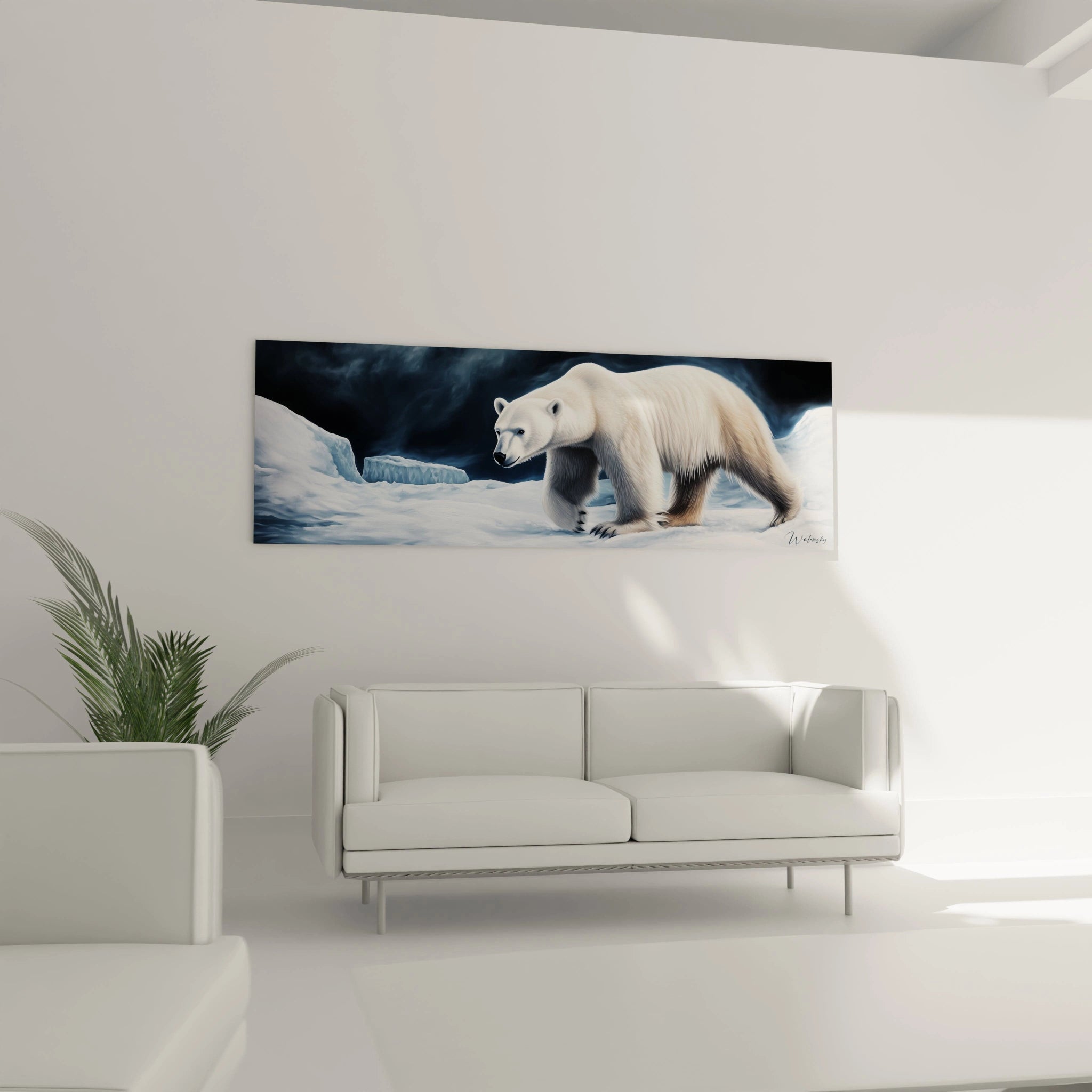 Tableau ours polaire Walensky accroché au-dessus d'un canapé blanc dans un salon minimaliste