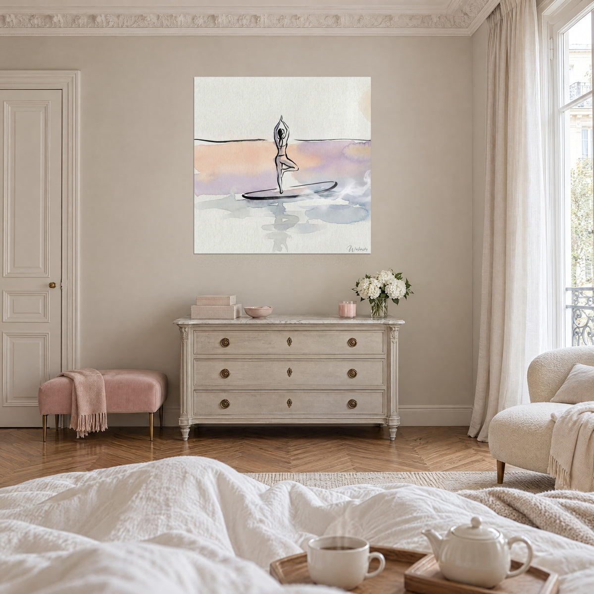 Wall art tree pose on calm water, peach and lavender stripes, cream dresser and pink pouf, above a bed in a bright bedroom
