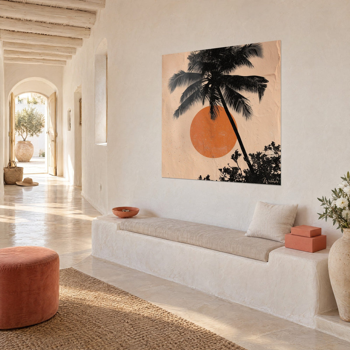 Wall art coconut palm silhouette in black ink and rust disc on apricot paper, white bench and arched hallway