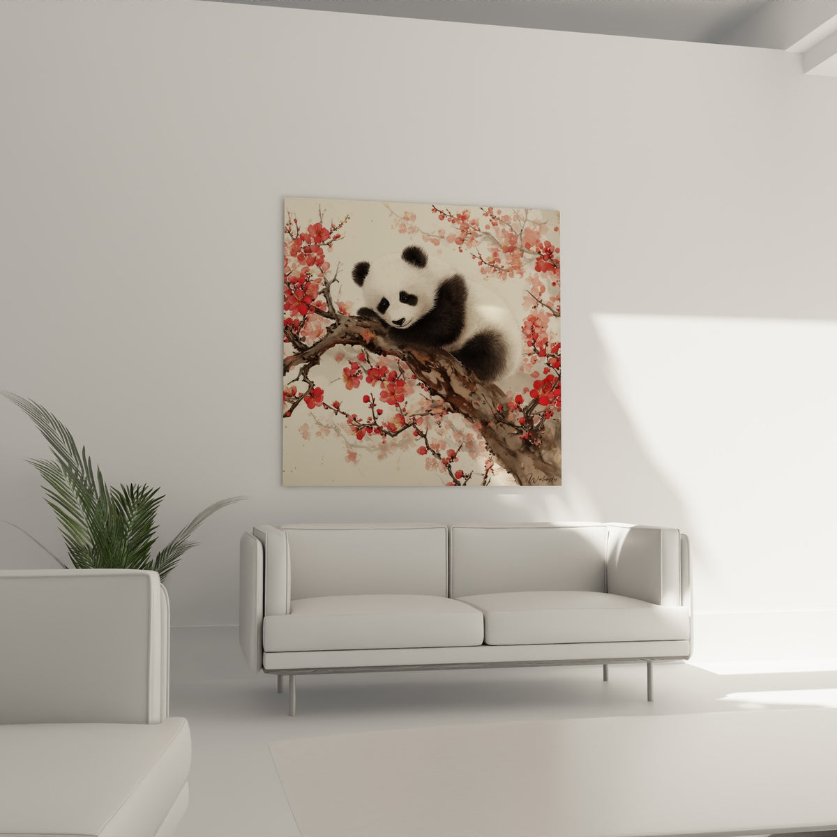 Ourson panda noir et blanc niché sur une branche fleurie, au-dessus d'un canapé dans un salon lumineux