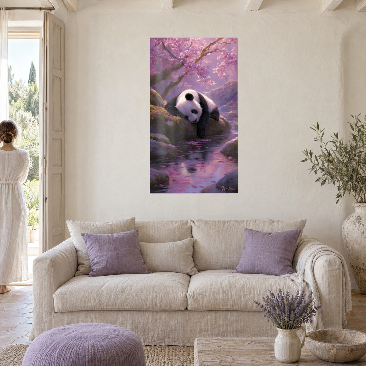 Tableau panda noir et blanc endormi sur un rocher moussu, cerisier rose en fleurs, au-dessus d'un canapé dans un salon lumineux