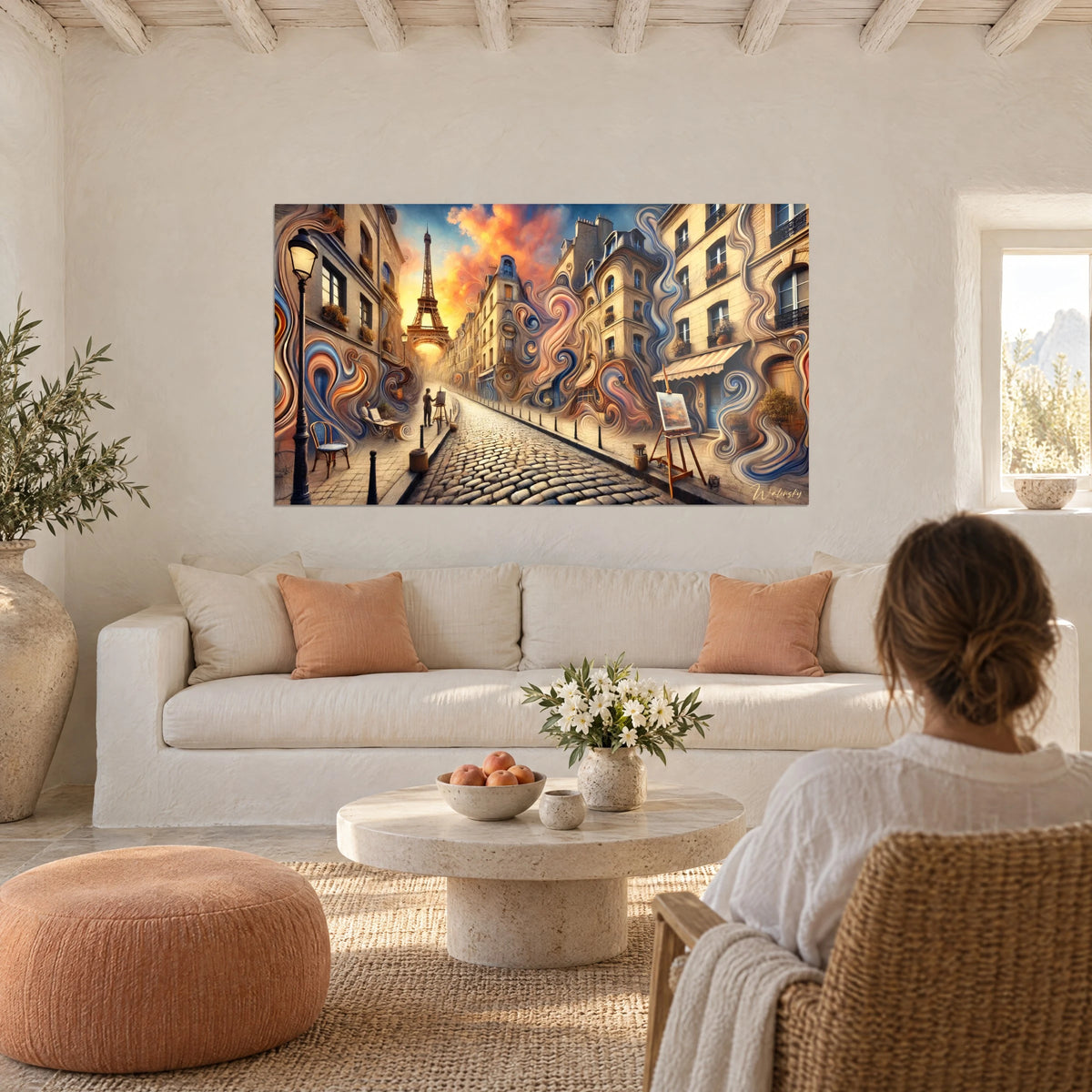 Wall art of a wavy Parisian cobblestone street, rusted Eiffel Tower under an orange and blue sky, above a sofa in a bright living room