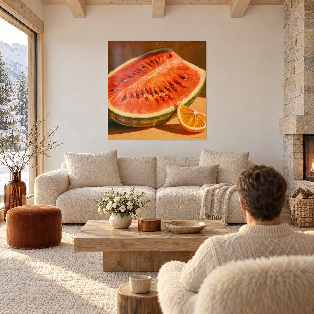 Wall art coral red watermelon with dark seeds, green rind and orange wedge, above a sofa in a bright living room