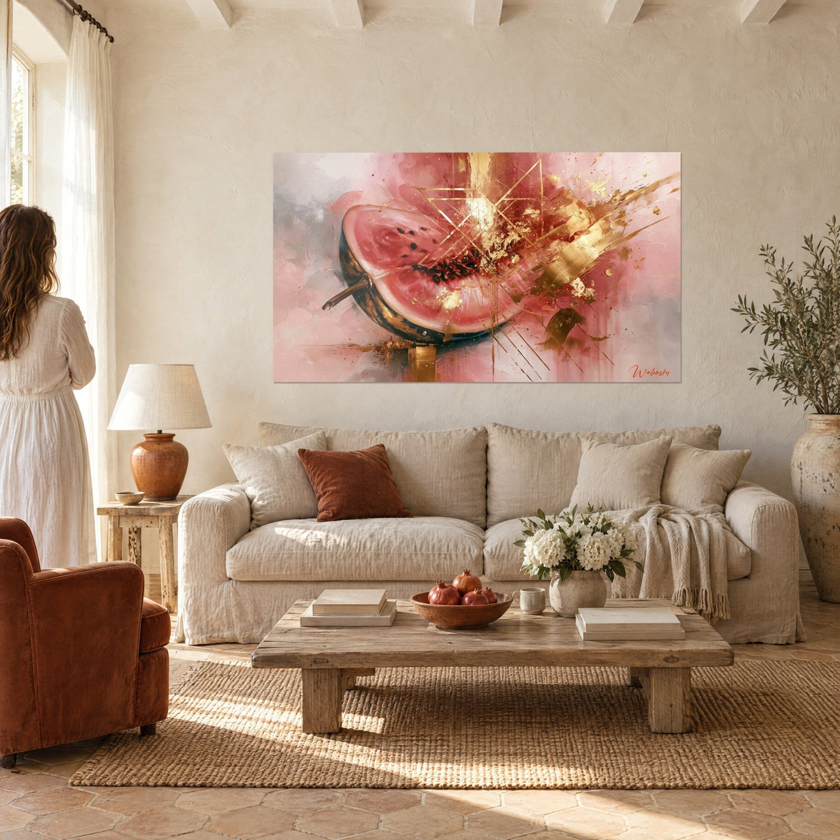 Wall art pink and gold watermelon slice, geometric lines and golden highlights, above a sofa in a bright living room