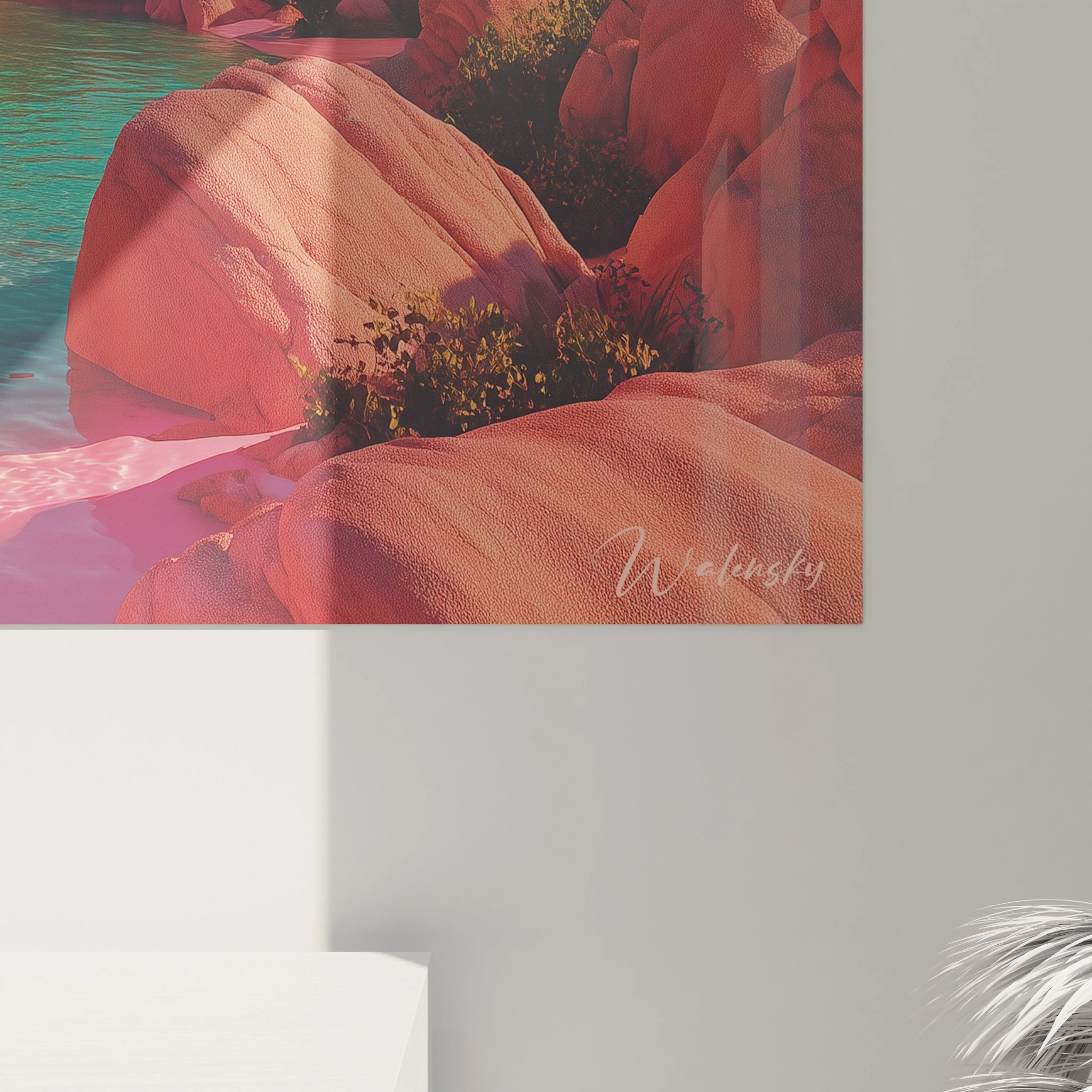 Walensky tableau mural paysage oasis montrant des rochers roses et une eau turquoise encadré sur mur blanc