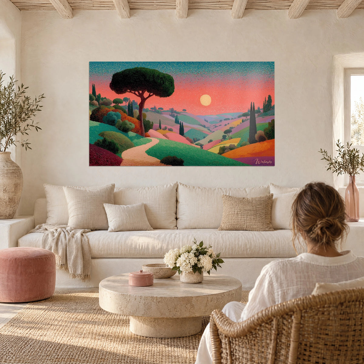 Wall art dark green umbrella pine dominating pink and emerald hills under a pale sun, above a sofa in a bright living room
