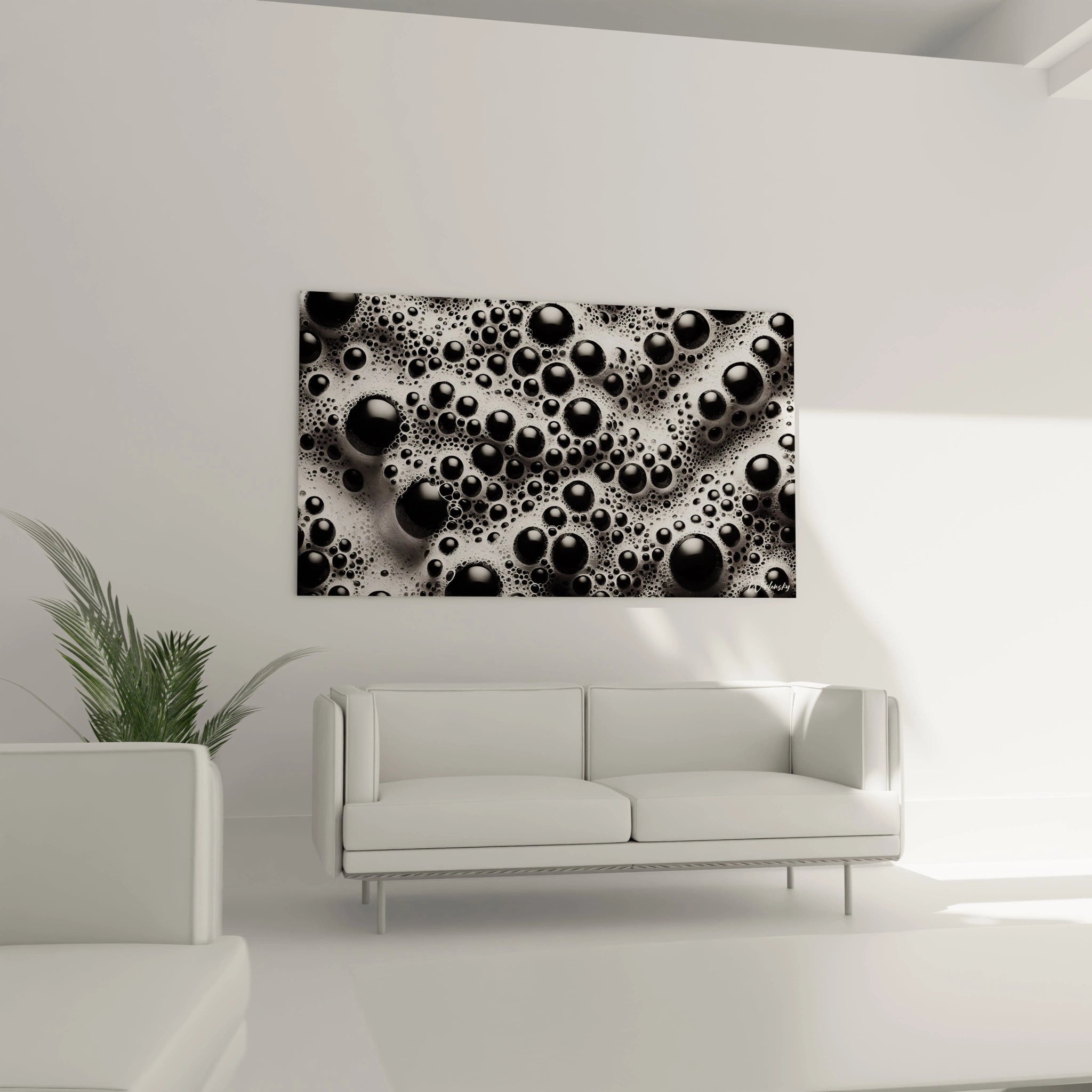 Un tableau artistique abstrait composé de sphères noires brillantes et d'une mousse argentée, créant un effet visuel dynamique avec des teintes argent, blanc et noir.