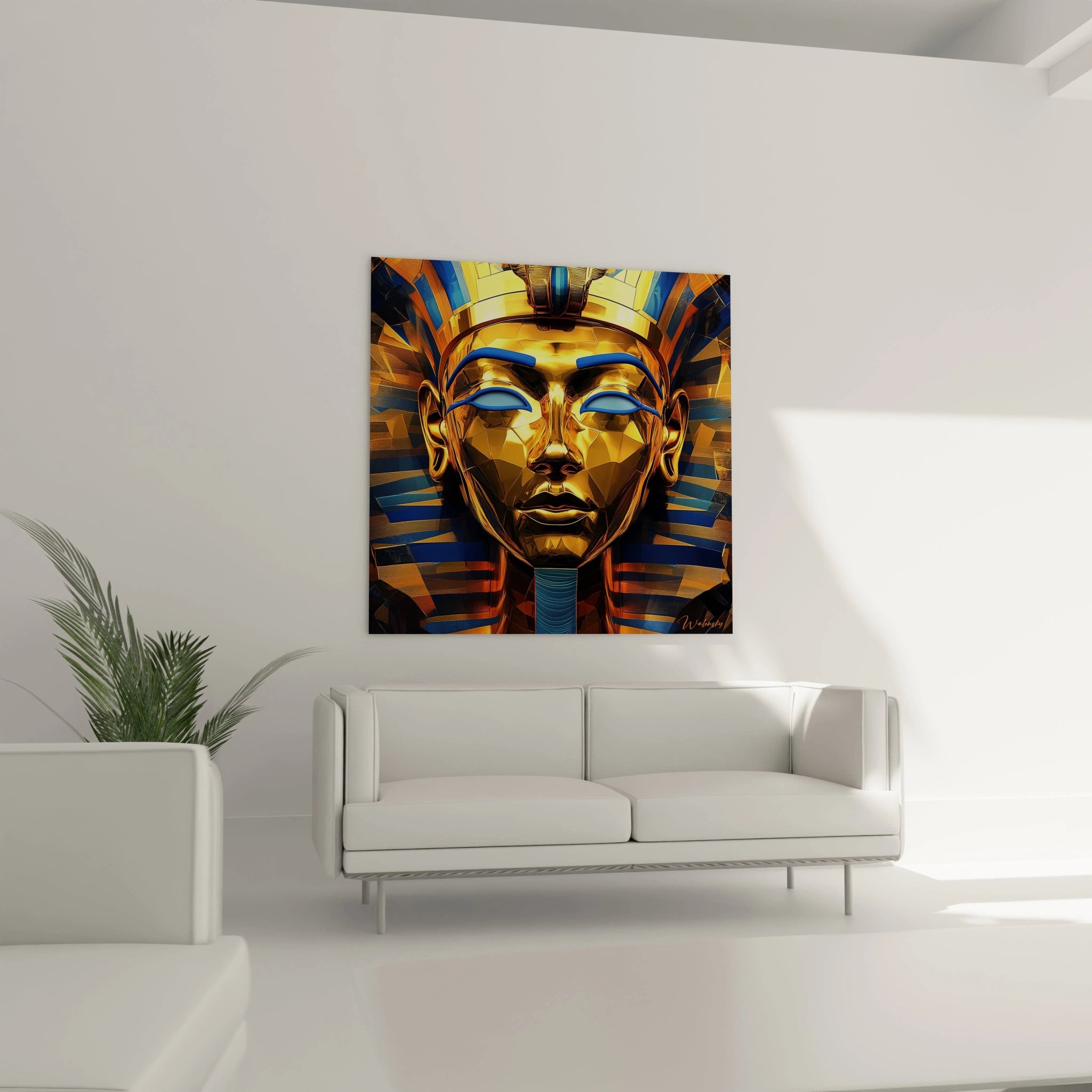 Tableau Egypte mural représentant un masque pharaonique doré aux accents bleus dans un salon minimaliste