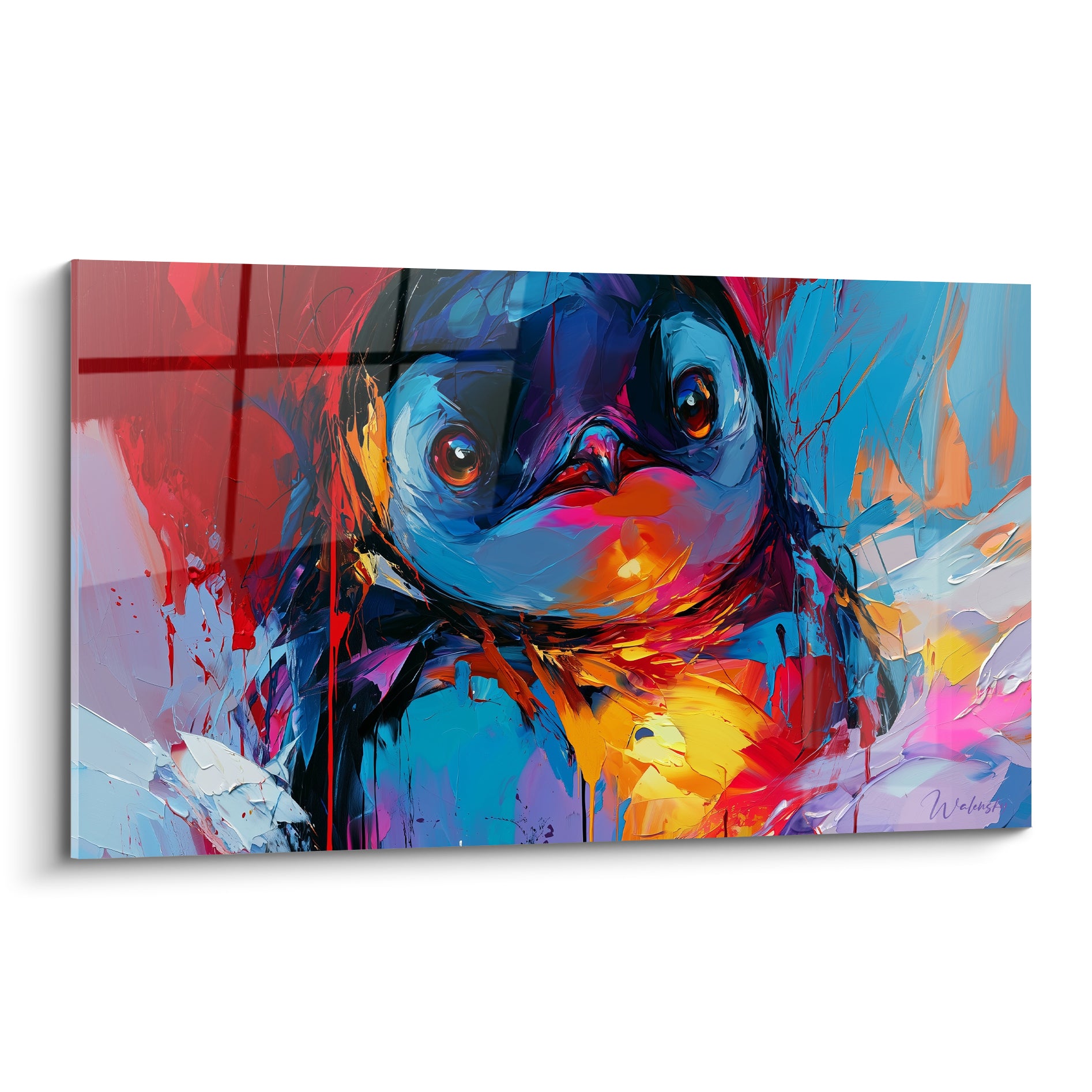 Pingouin en gros plan aux yeux orangés, plumage bleu marine et rouge vif éclatant