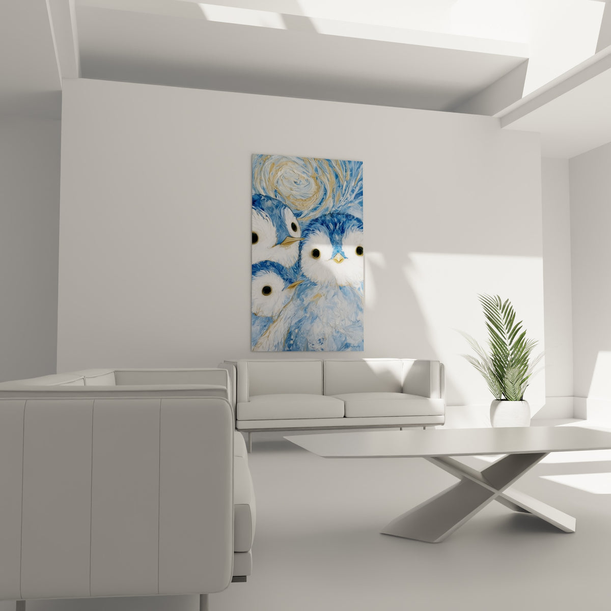 Regards attendrissants bleu marine et blanc placés au-dessus d'un canapé dans un salon lumineux