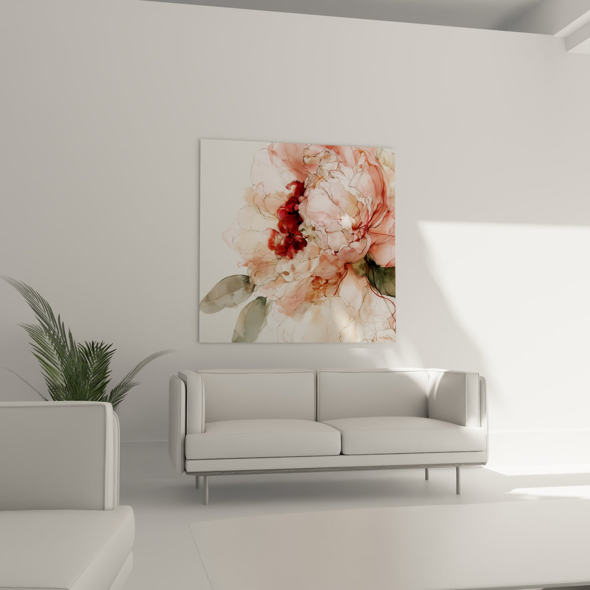 Pétales de pivoine rose poudré et grenat accrochés au-dessus d'un canapé dans un salon lumineux