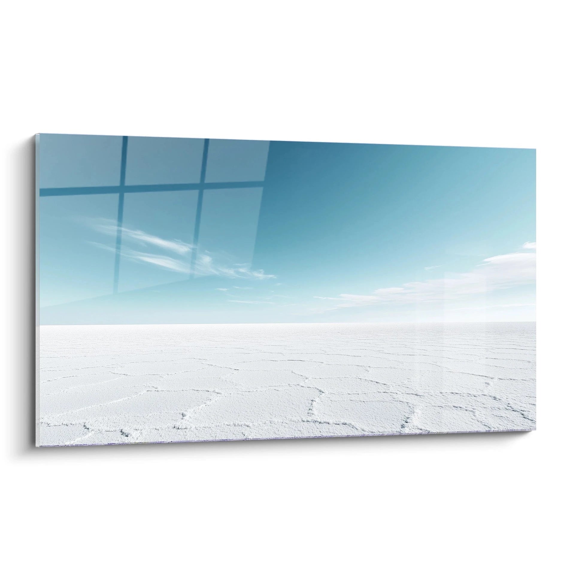 Tableau horizon blanc présentant une vaste étendue de sel immaculé sous un ciel bleu azuré, avec des lignes géométriques naturelles parcourant la surface cristalline, créant un contraste minimaliste entre terre et ciel.