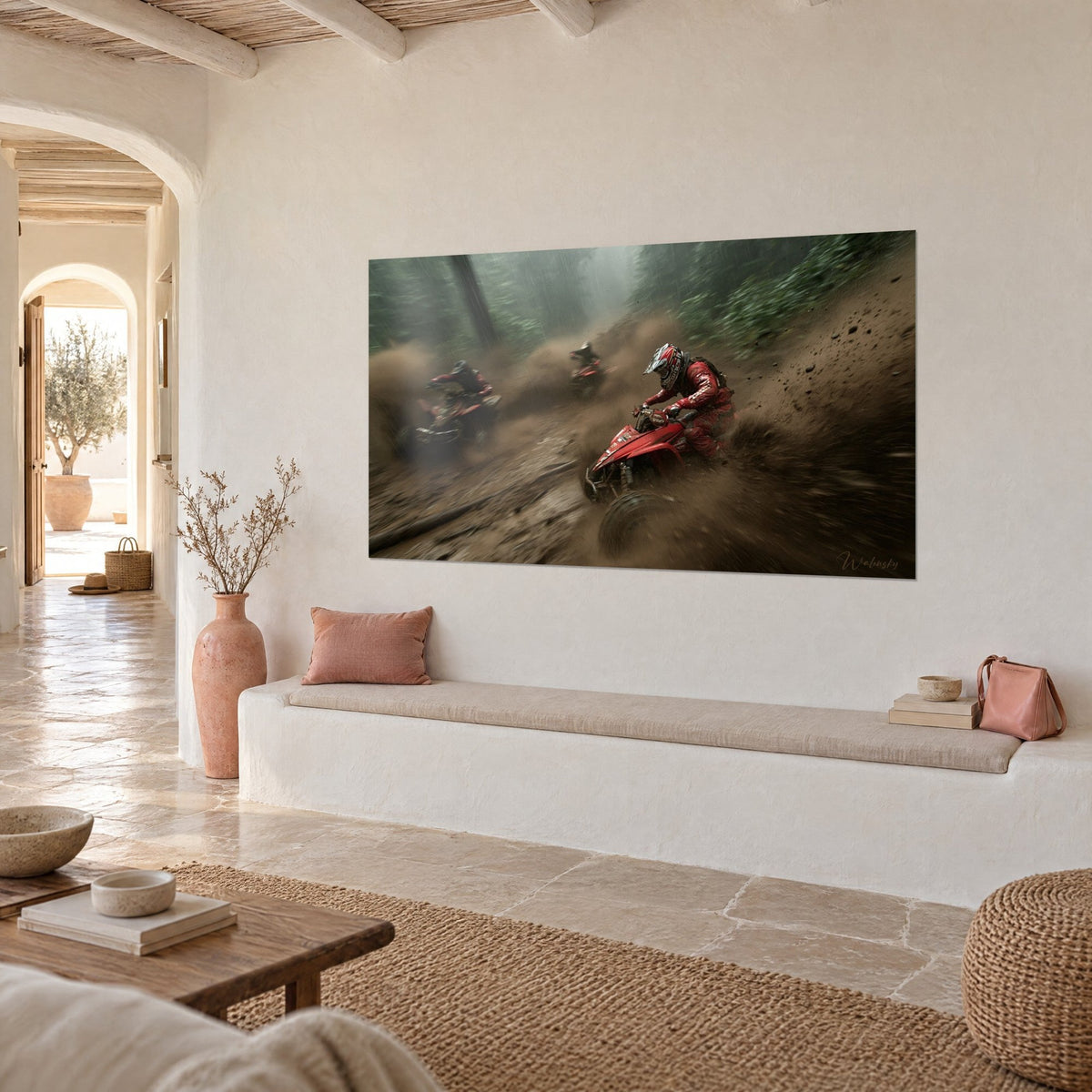 Wall art quad bike race through misty forest, brown mud spray and a red machine leaning into a turn, hung in a Mediterranean home