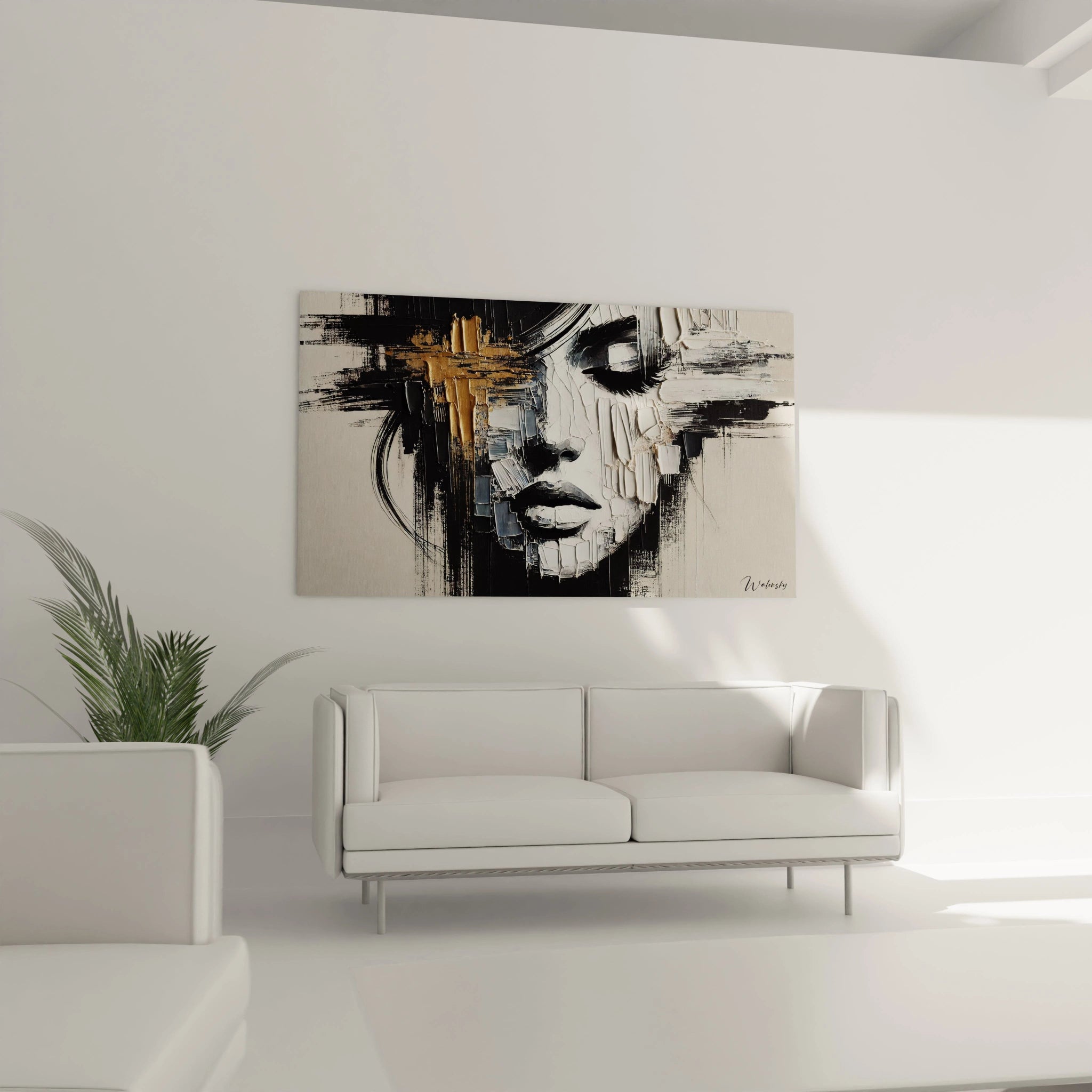 "Reflet en noir et or", au-dessus du canapé, transforme le salon. Les contrastes noirs, blancs et dorés, alliés aux textures en relief, créent une atmosphère moderne et élégante.