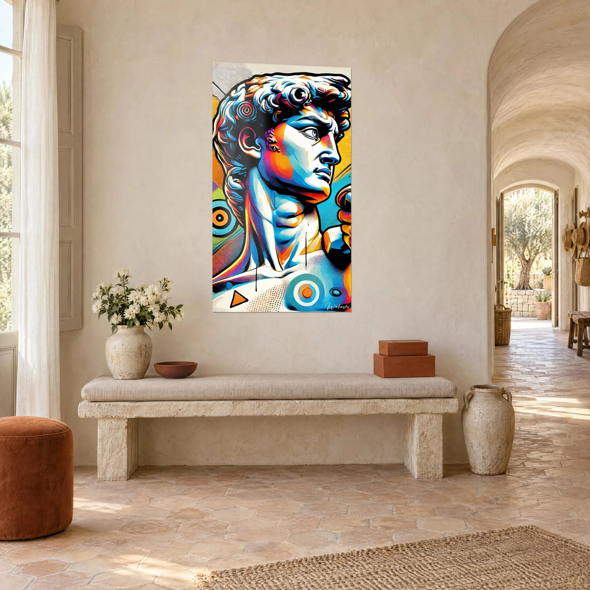 Wall art reimagined Michelangelo's David, white and blue torso outlined in black, orange targets, three-quarter view in a Provençal farmhouse