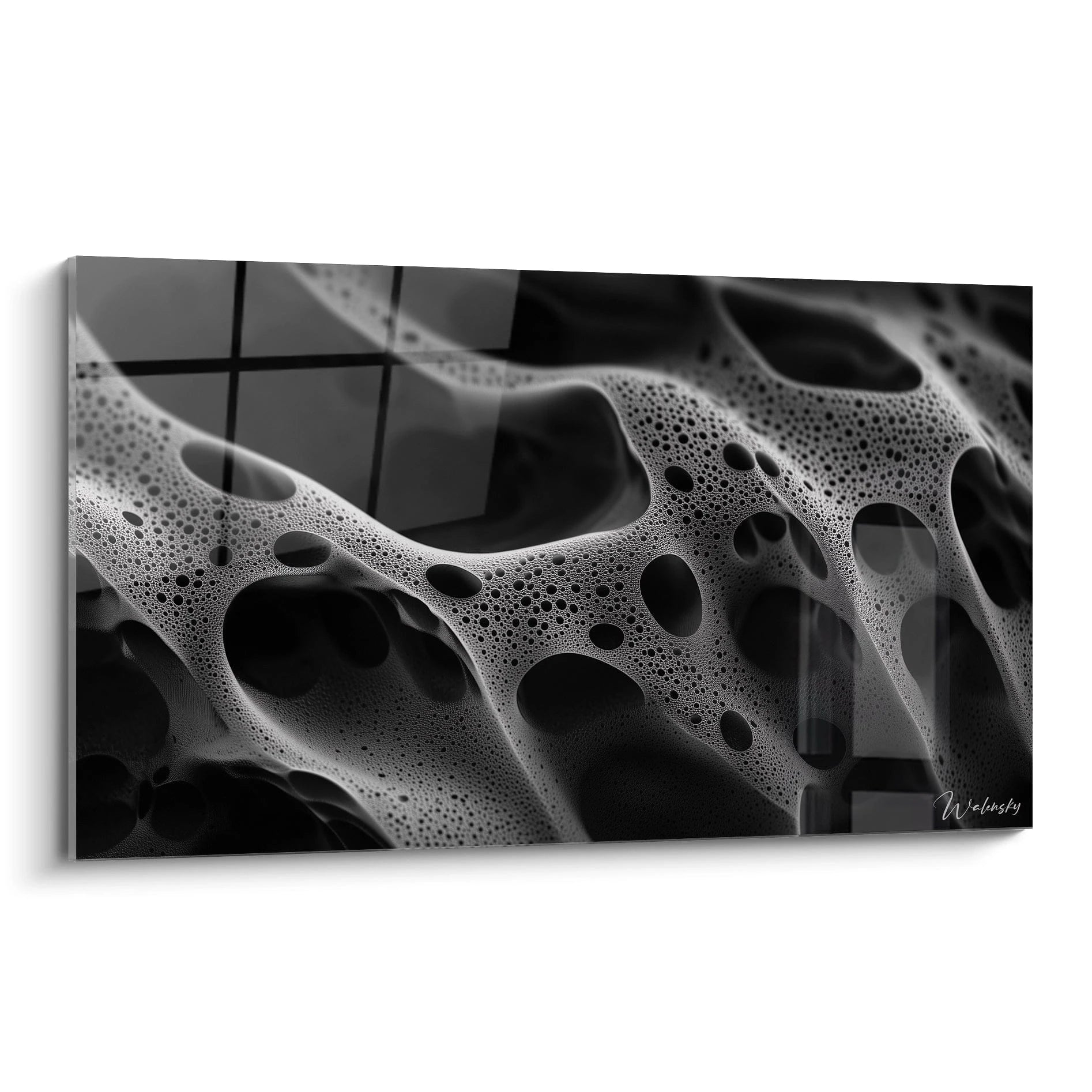 Un tableau texturé abstrait présentant des motifs fluides et perforés, en noir profond et blanc éclatant, avec des contours irréguliers et un effet visuel dynamique.