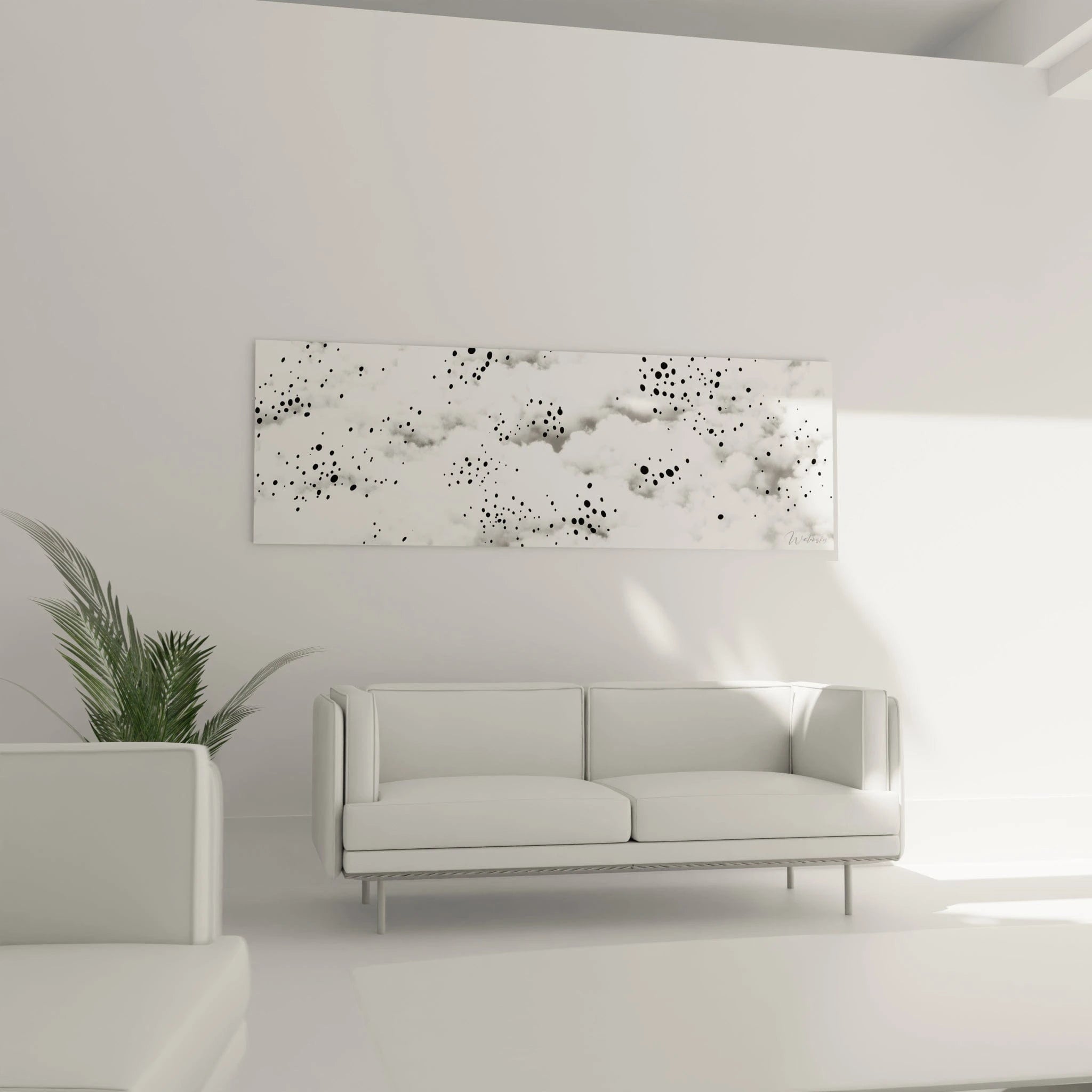 Tableau tacheté noir et blanc de Walensky accroché dans un salon moderne avec canapé