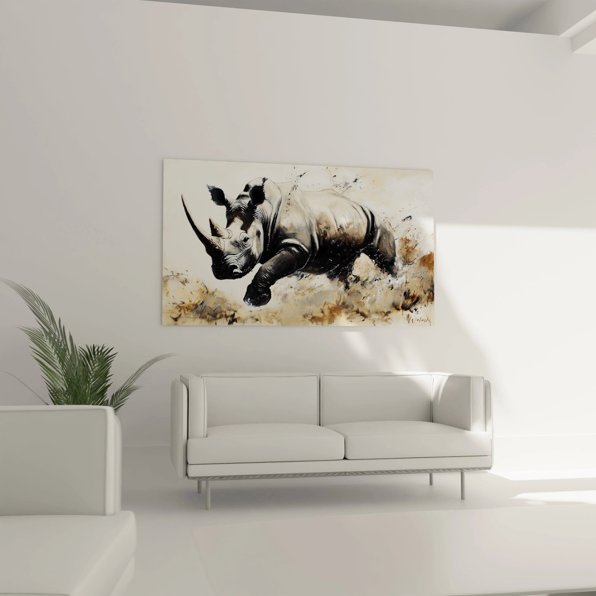 Tableau rhinocéros Walensky accroché au-dessus d'un canapé dans un salon moderne blanc