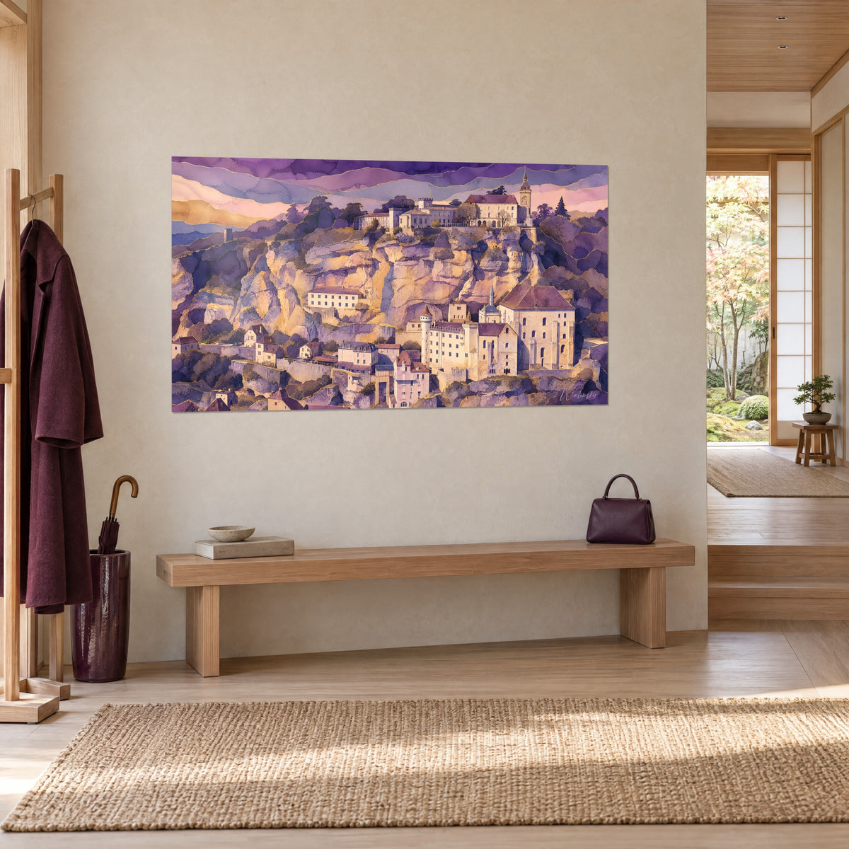 Clocher et toitures rouges du village ocre surplombant un canapé dans un salon lumineux